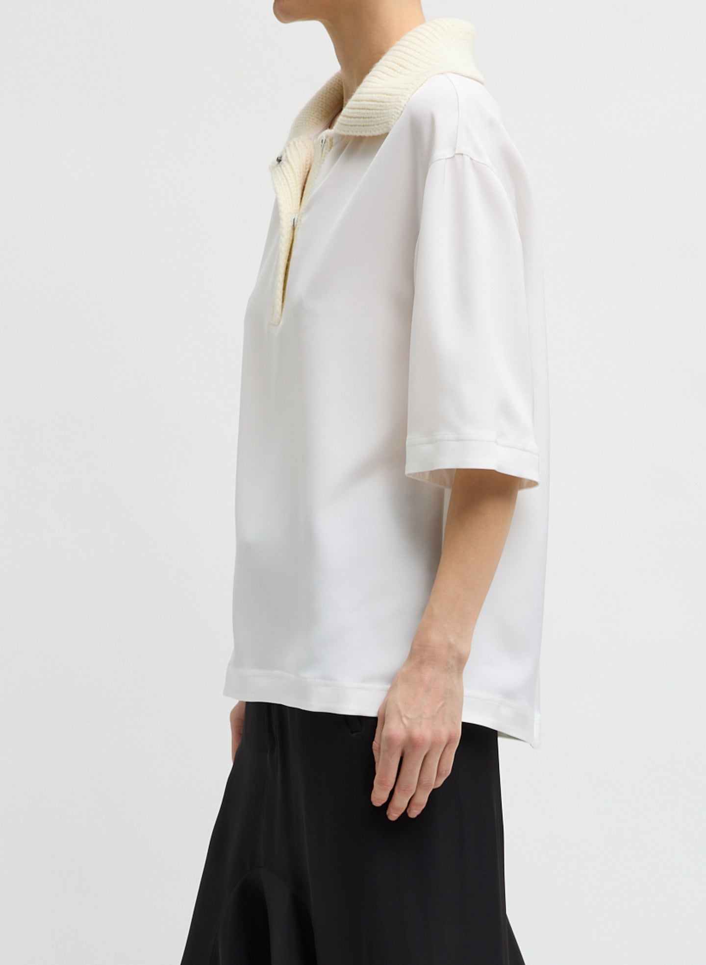 Ivory Stretch Silk Nylon CDC Knit Collar Cocoon Top - short sleeve collared top, side view on model