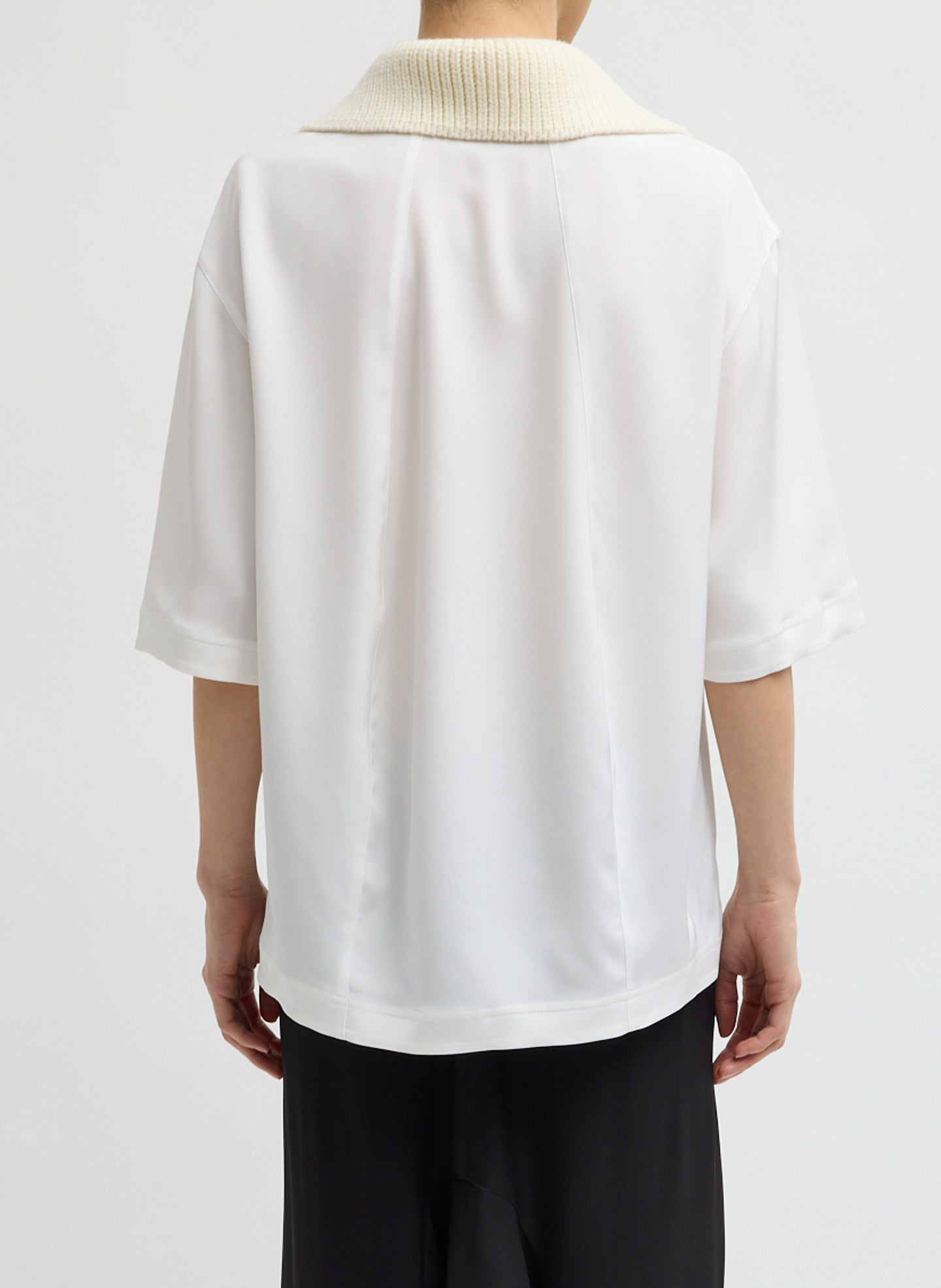 Ivory Stretch Silk Nylon CDC Knit Collar Cocoon Top - short sleeve collared top, back view on model