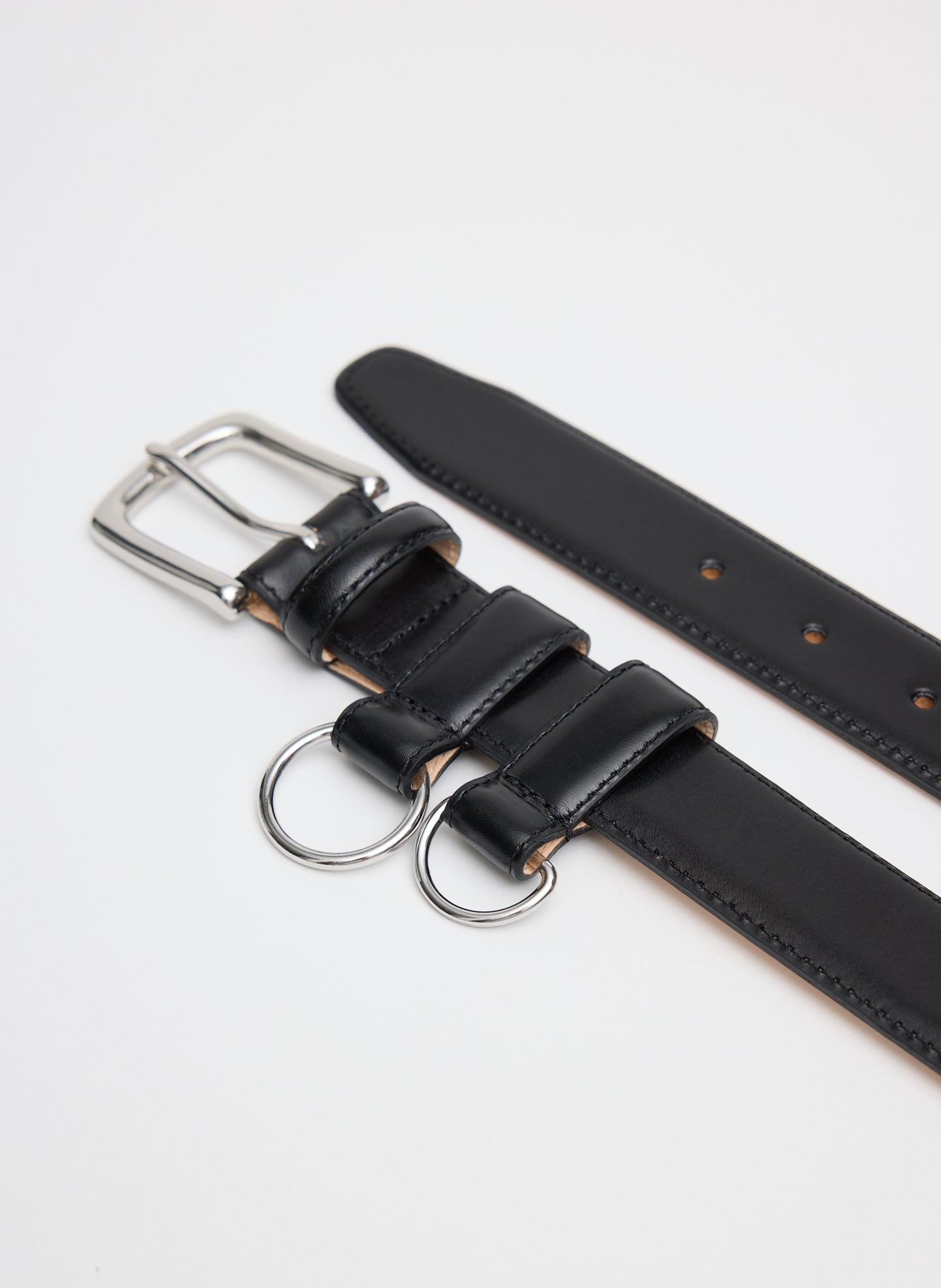 Black Classic Ring Hardware Leather Belt - closeup of belt buckle and d-rings