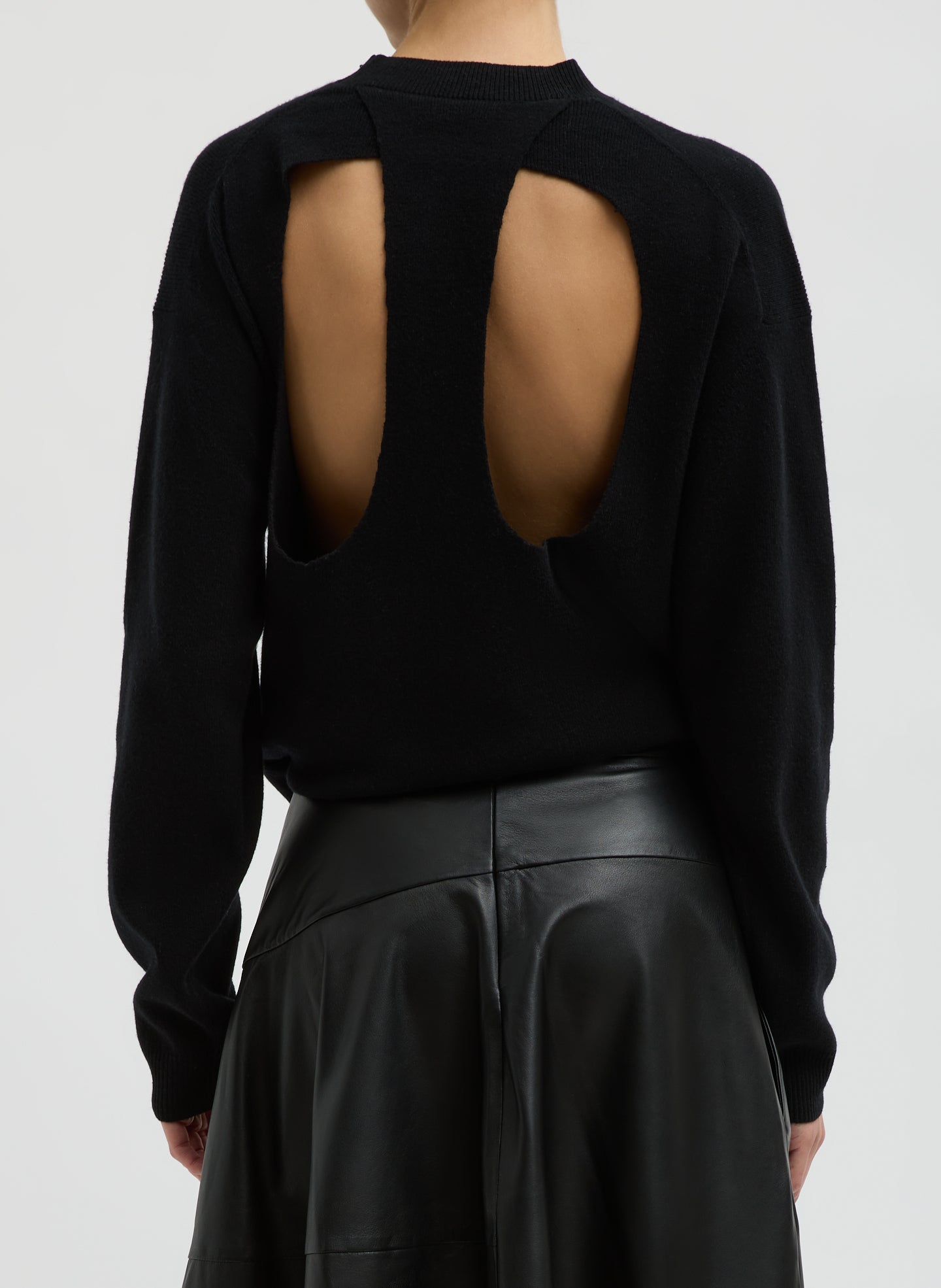 Black Anna Merino Wool Cut Out Racerback Pullover - crewneck sweater, back view on model