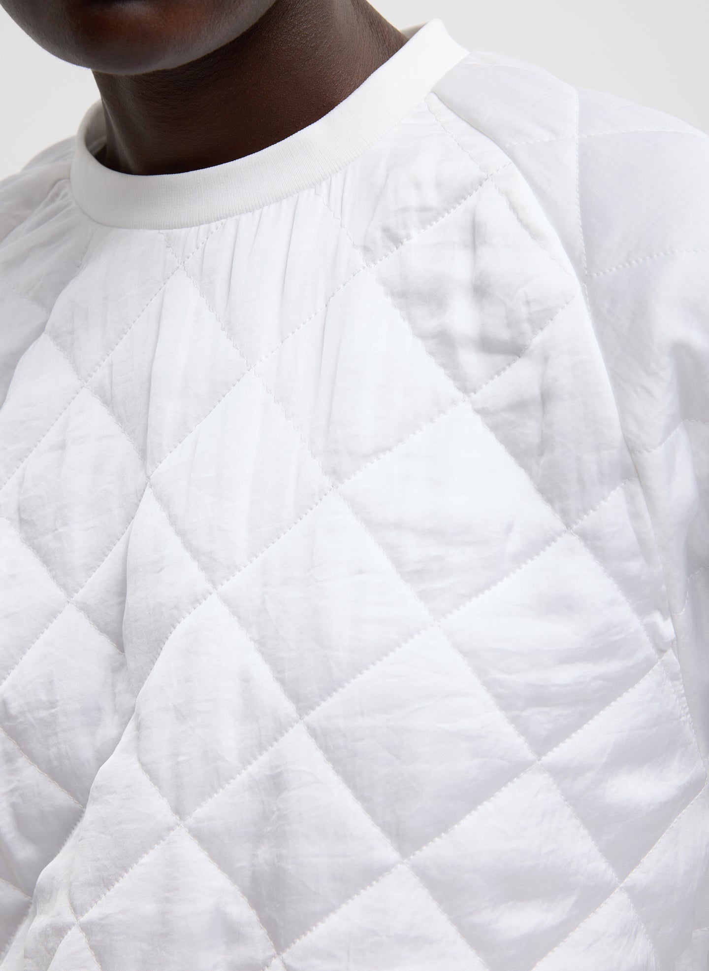 White Cozy Quilting Sweatshirt - closeup of quilted fabric