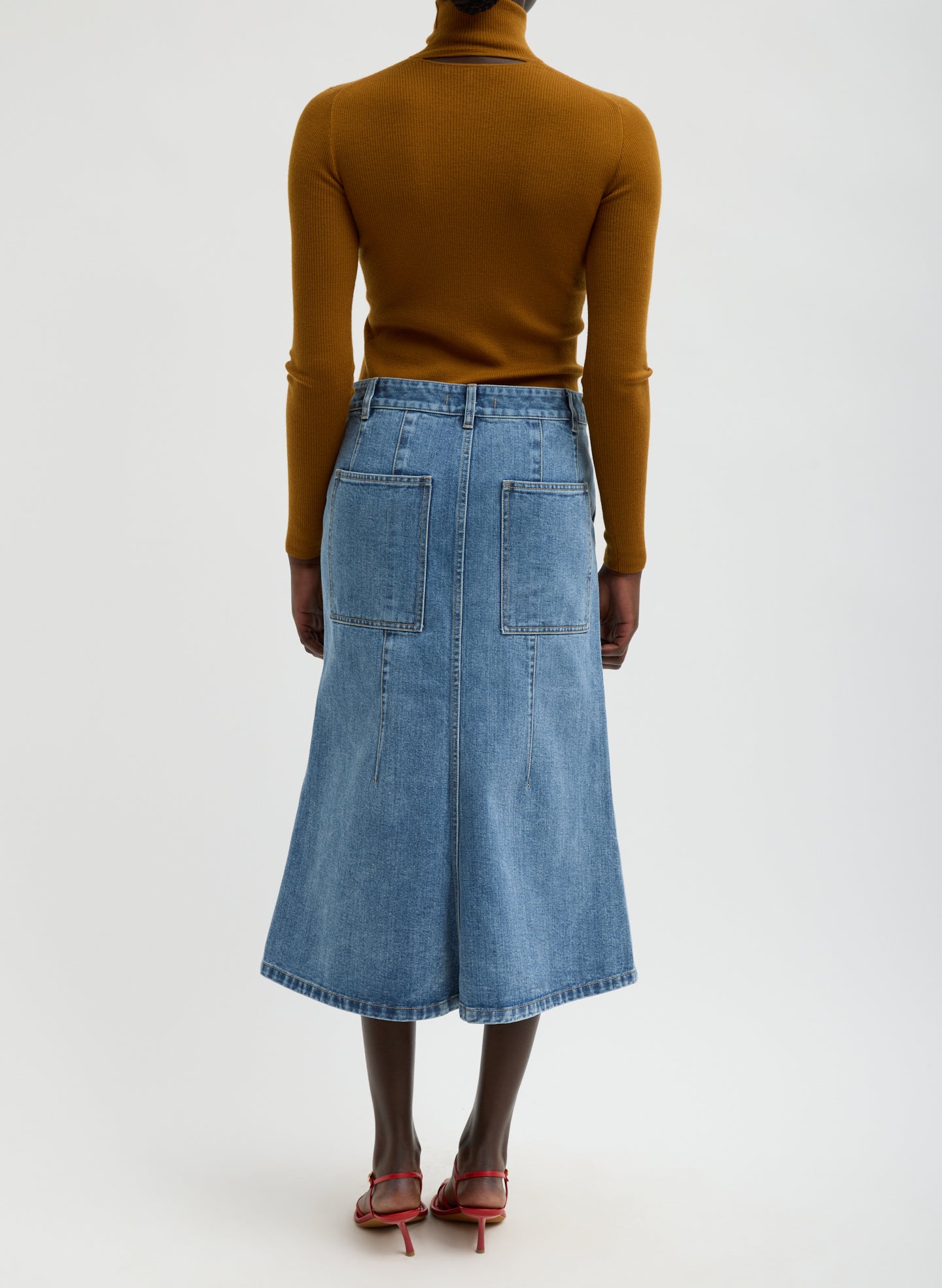 Classic Blue Denim Sculpted Silke Skirt - knee length skirt, back view on model