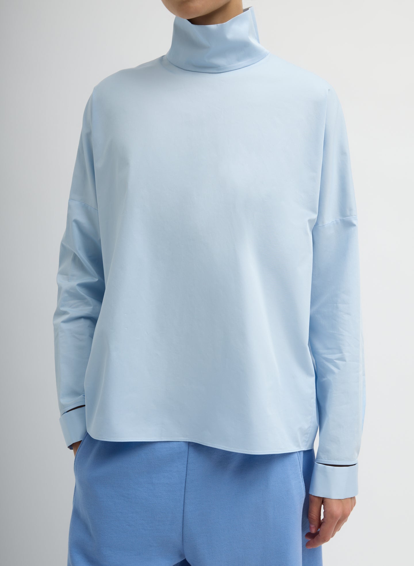 Eco Poplin Funnel Neck Dolman Top - Chambray Blue Eco Poplin Funnel Neck Dolman Top - long sleeve top, front view on model