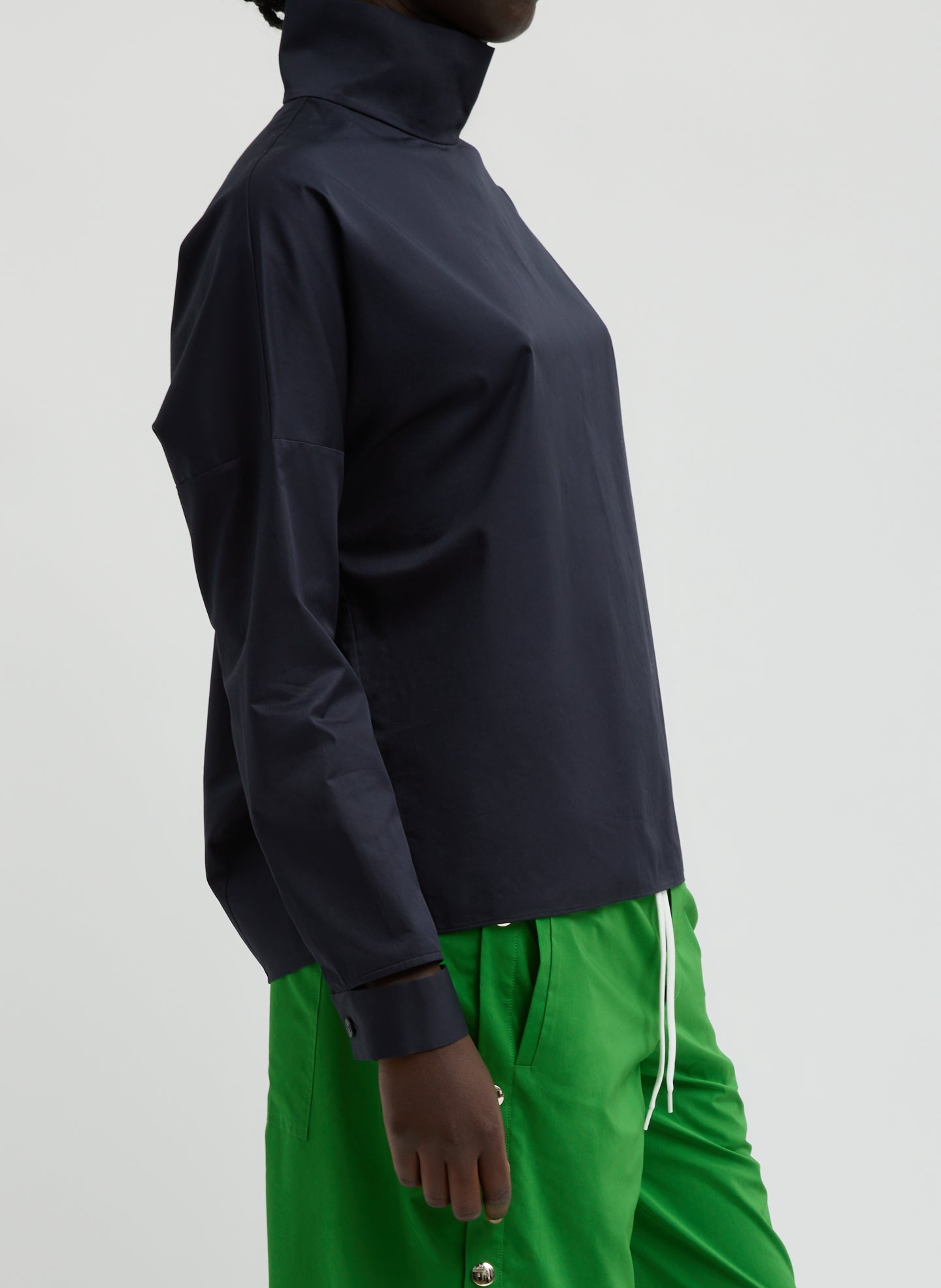 Dark Navy Eco Poplin Funnel Neck Dolman Top - long sleeve top, side view on model