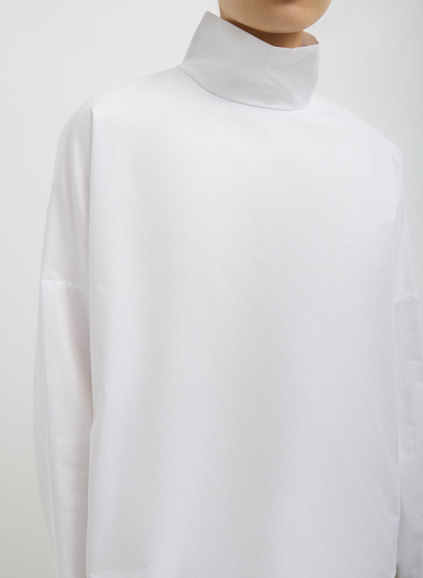 White Eco Poplin Funnel Neck Dolman Top - closeup of funnel neck