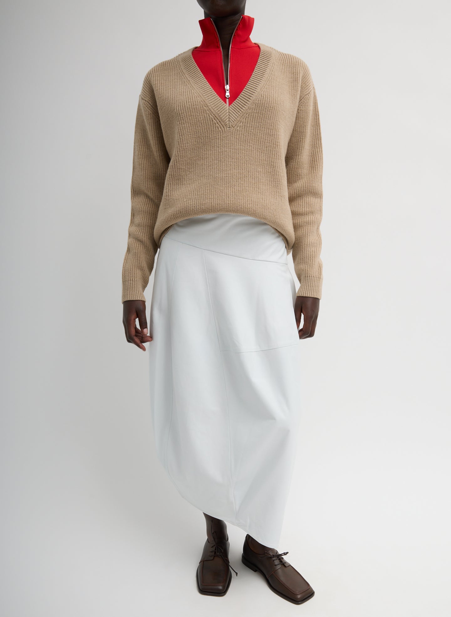 Leather Asymmetrical Balloon Skirt - Optic White Leather Asymmetrical Balloon Skirt - leather midi skirt, front view on model