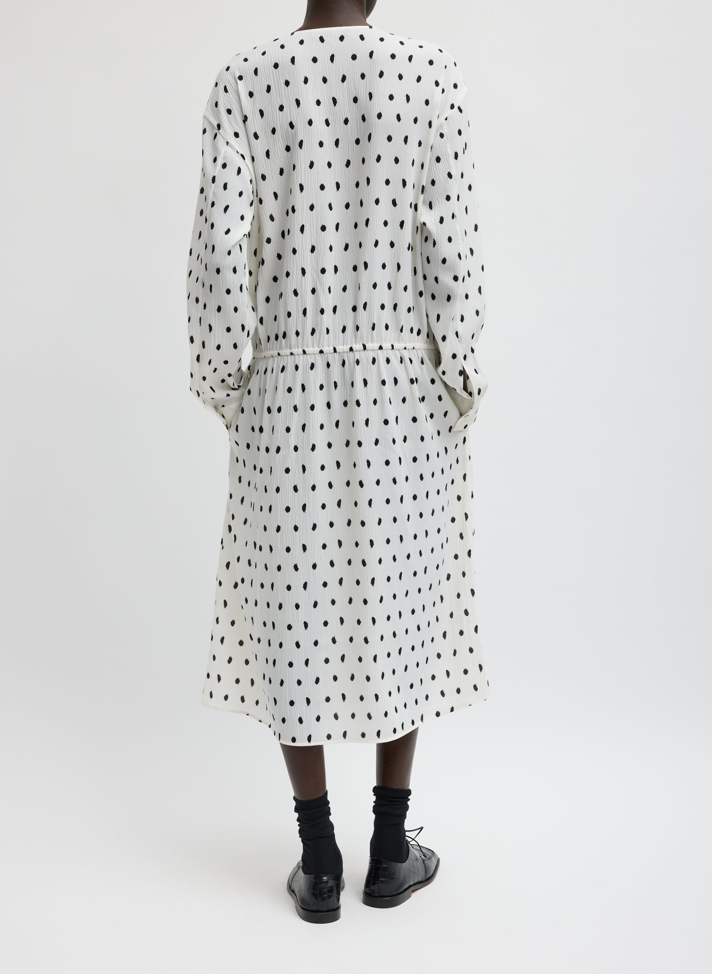 Black and White Scribble Dot Print Strech Plisse Wrap Dress - long sleeve midi dress, back view on model