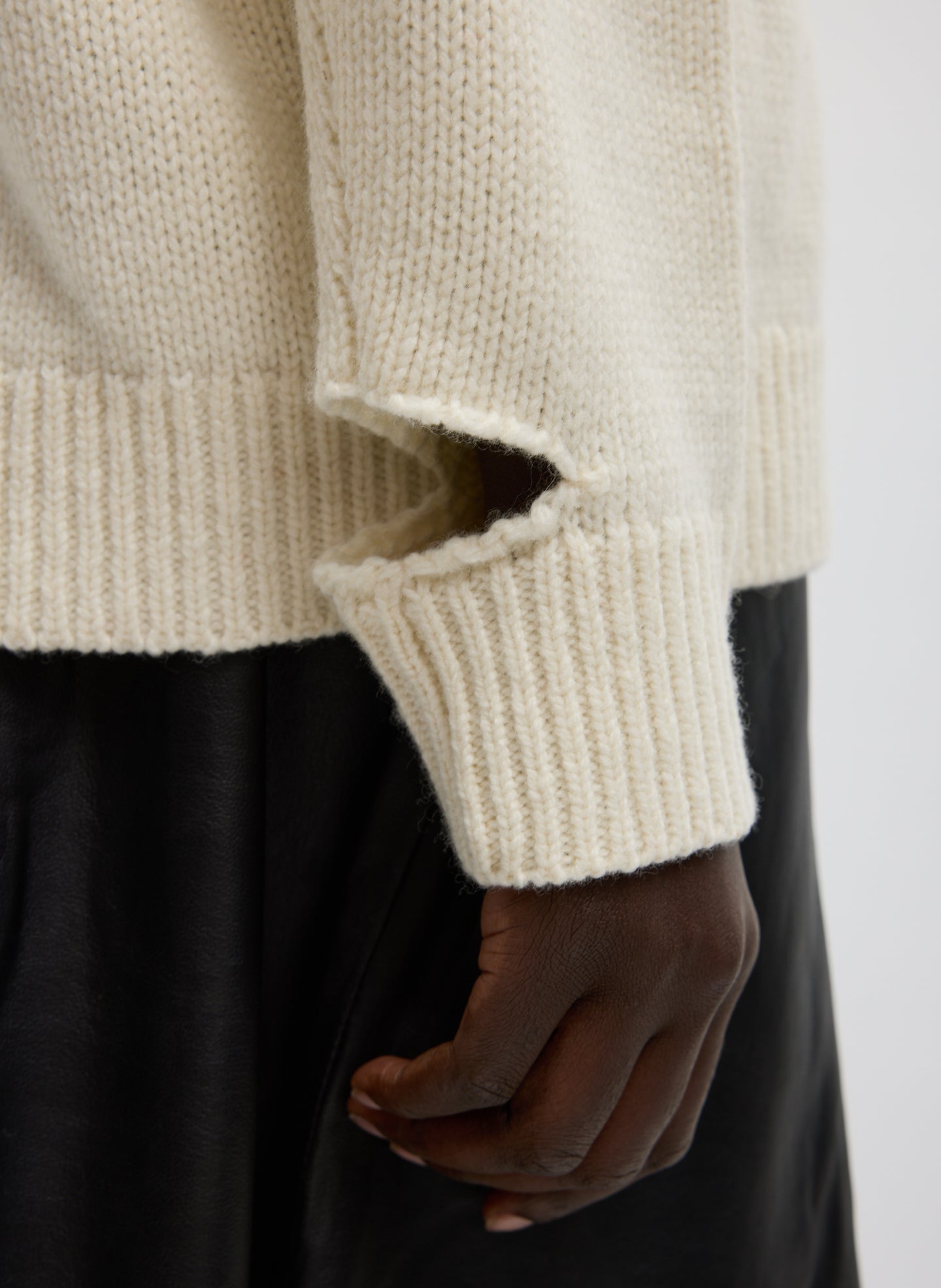 Ivory Multi Soft Wool Ski Easy Pullover Crewneck Sweater - closeup of slit detail at wrist
