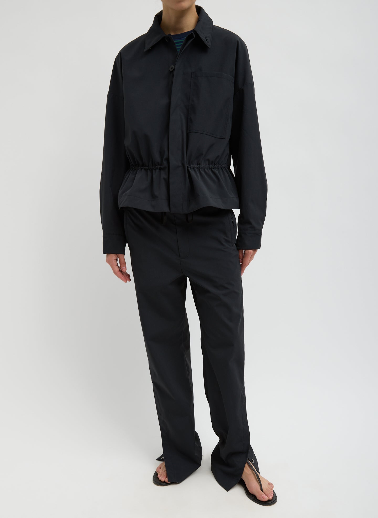 Black Tech Suiting Anorak Bomber - video on model - full look, front view on model