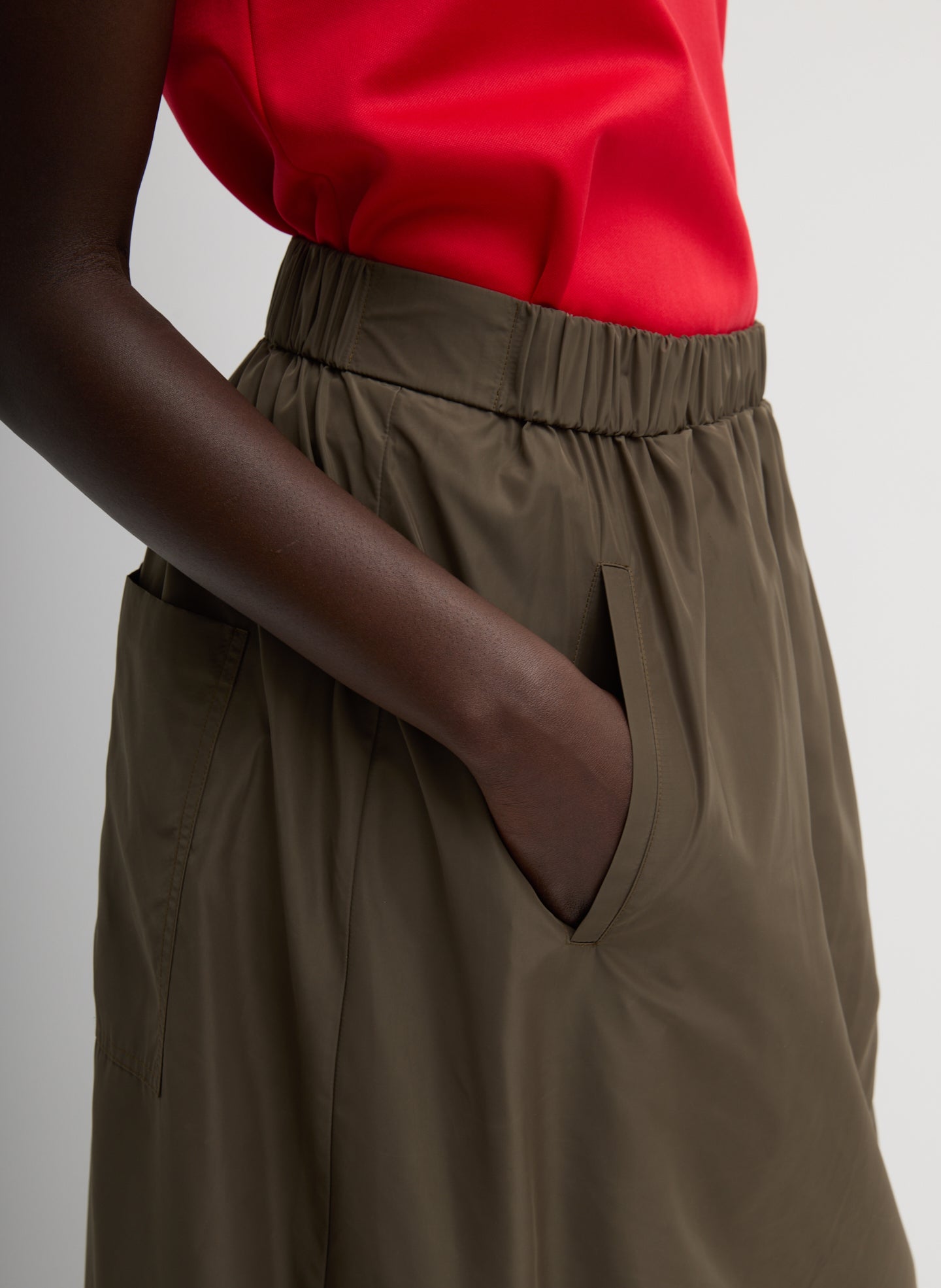 Dark Hazelnut Green Italian Sporty Nylon Maxi Anorak Skirt - closeup of side pocket detail