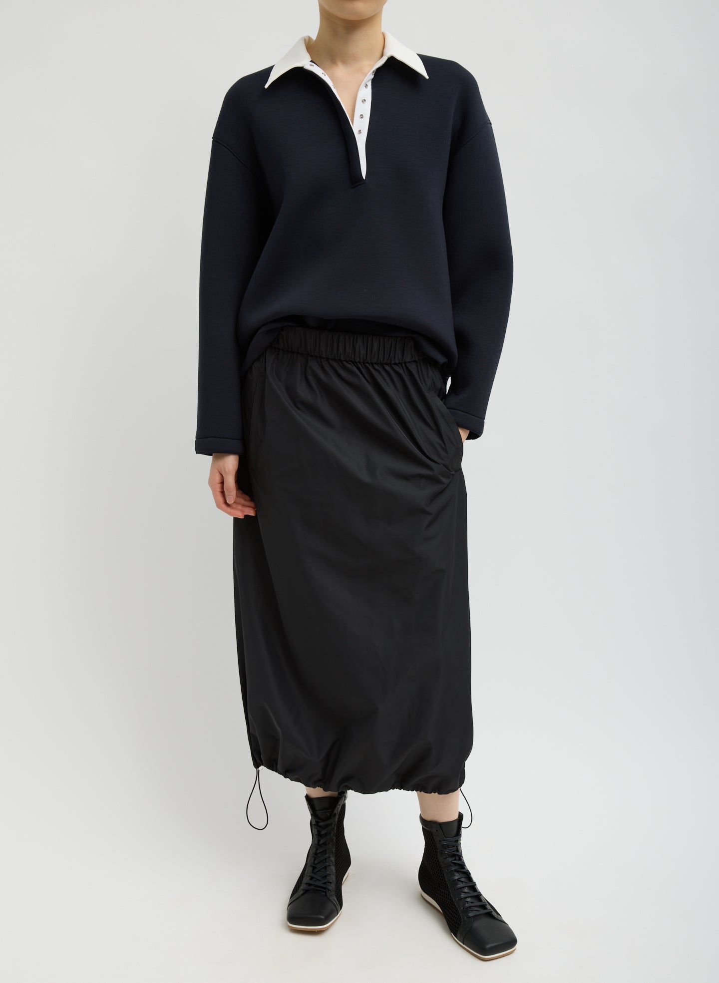 Italian Sporty Nylon Midi Anorak Skirt - Black Italian Sporty Nylon Midi Anorak Skirt - full look, front view on model