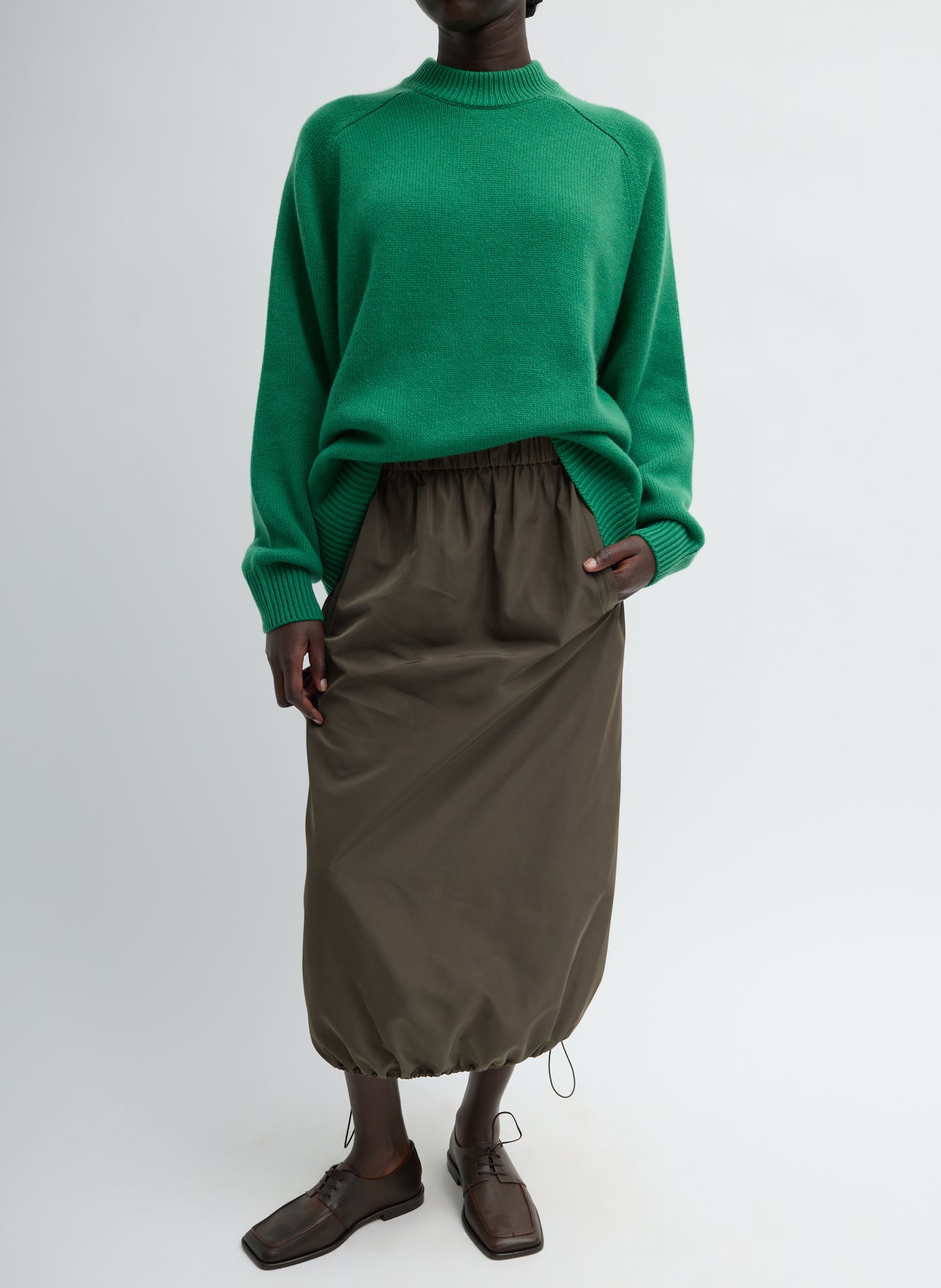 Italian Sporty Nylon Midi Anorak Skirt - Dark Hazelnut Green Italian Sporty Nylon Midi Anorak Skirt - full look, front view on model