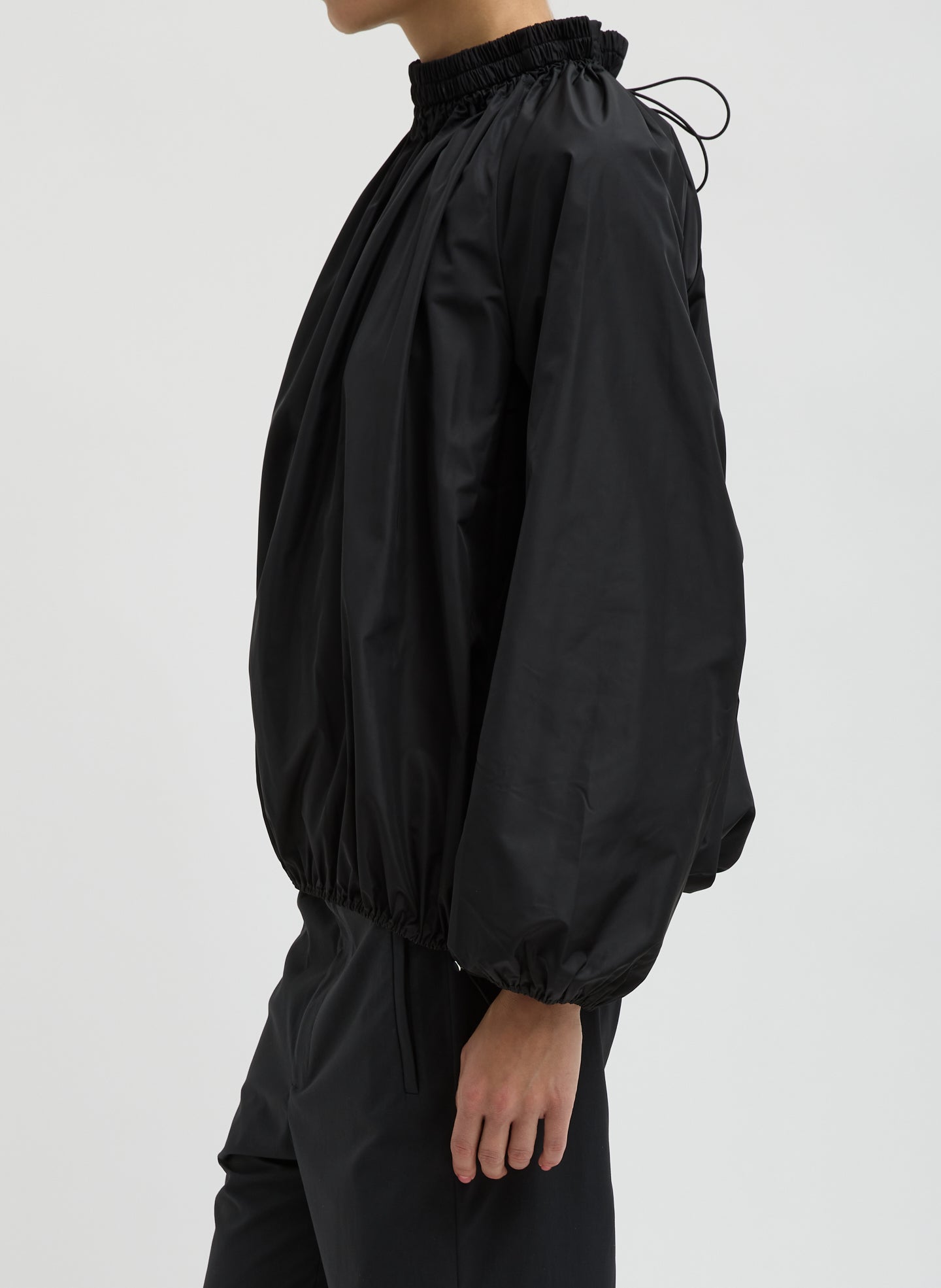 Black Italian Sporty Nylon Shirred Anorak Top - side view on model