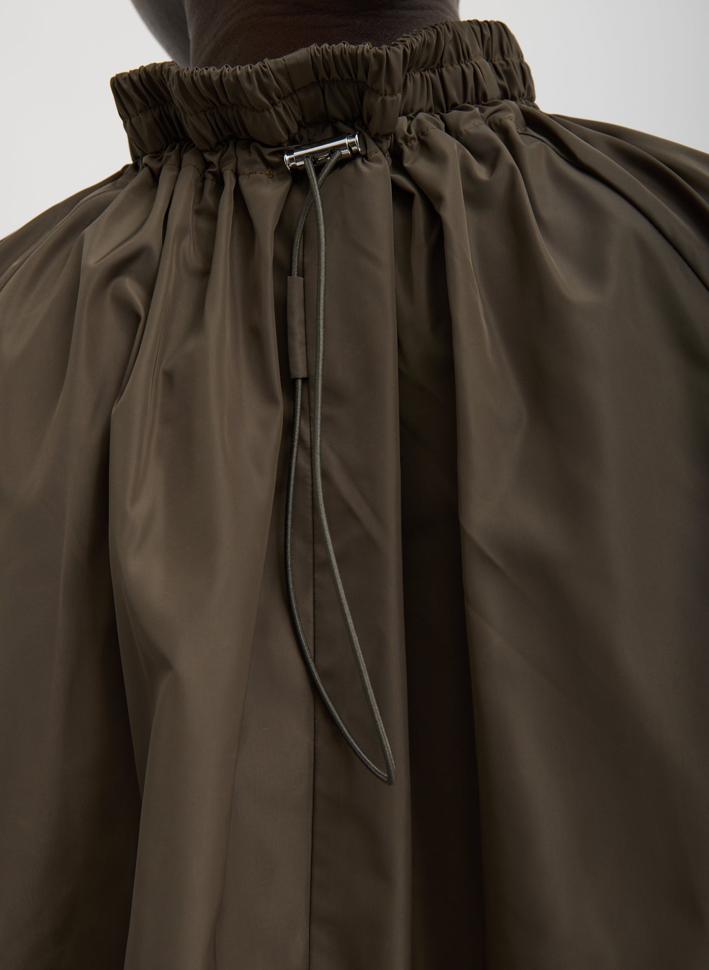 Dark Hazelnut Green Italian Sporty Nylon Shirred Anorak Top - closeup of drawstring detail at back
