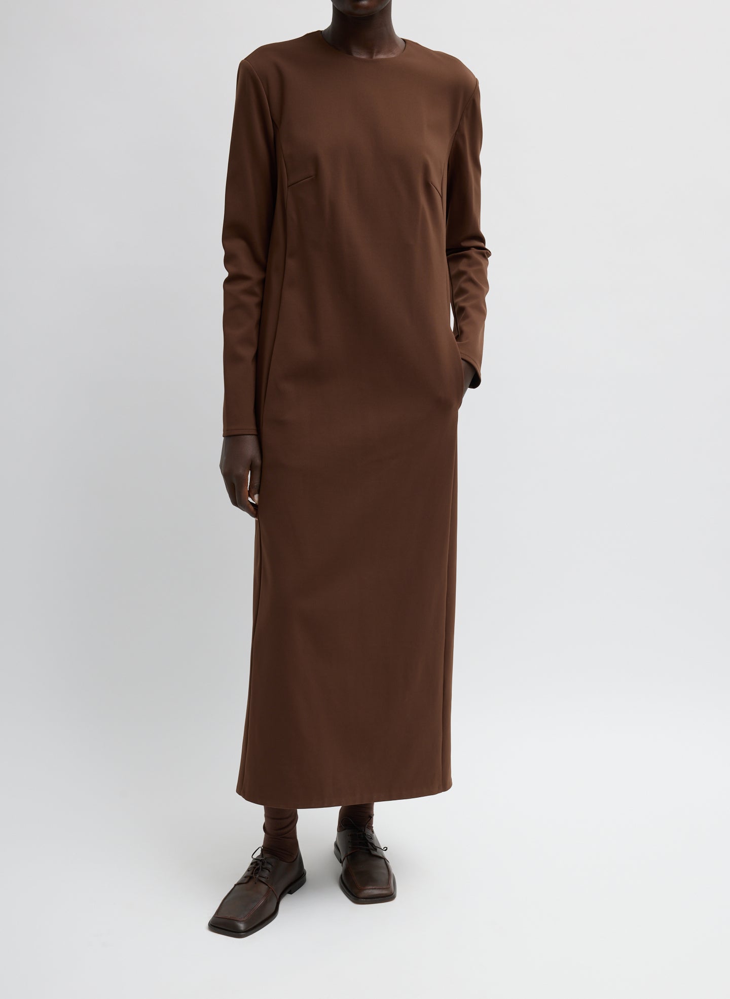 Brown Compact Ultra Stretch Knit Dress With Cut Out Back - long sleeve maxi dress, front view on model
