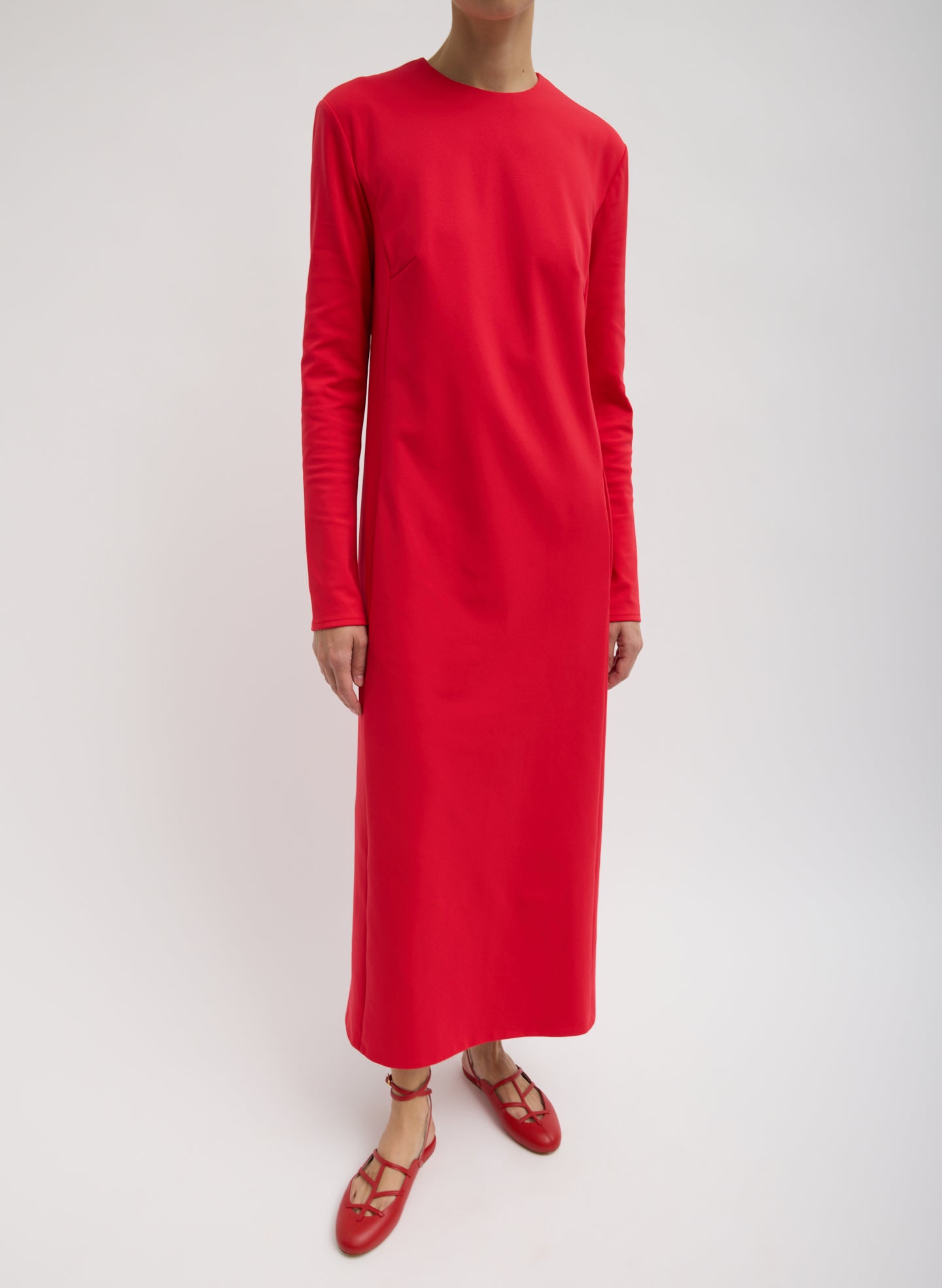 Compact Ultra Stretch Knit Dress With Cut Out Back - Red Compact Ultra Stretch Knit Dress With Cut Out Back - long sleeve maxi dress, front view on model