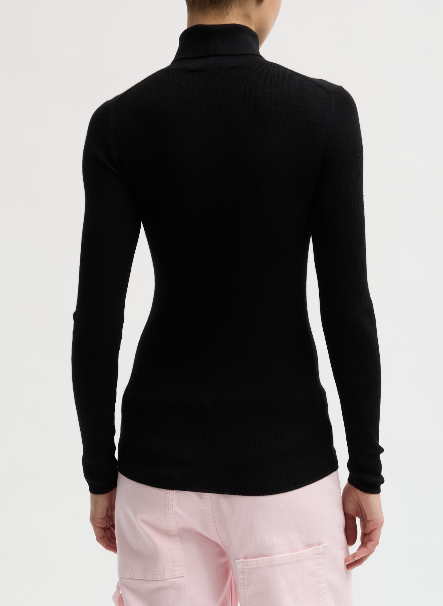 Black Feather Weight Ribbed Split Neck Turtleneck - back view on model