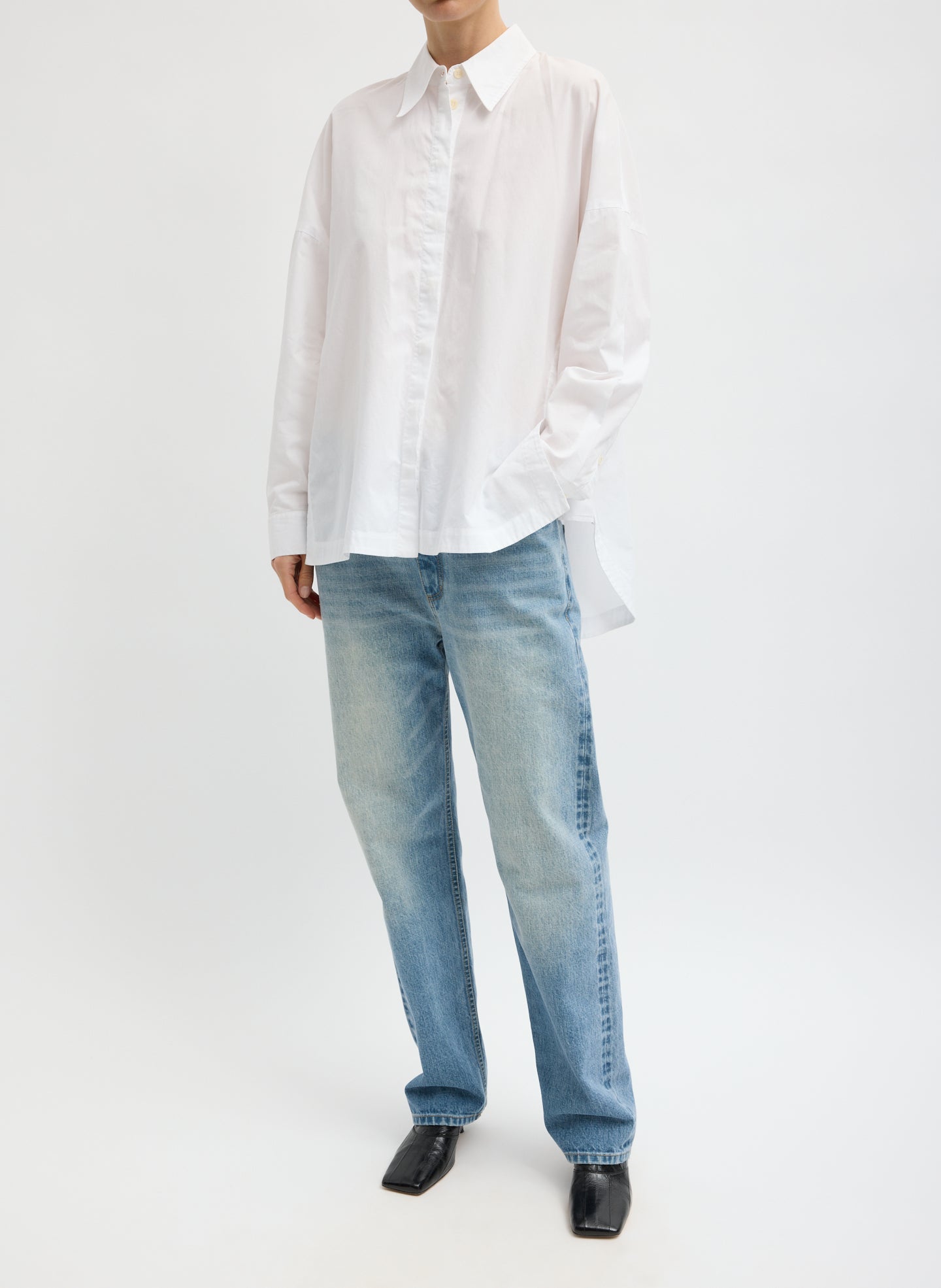 White Gabe Shirt - oversized button down top, front view on model