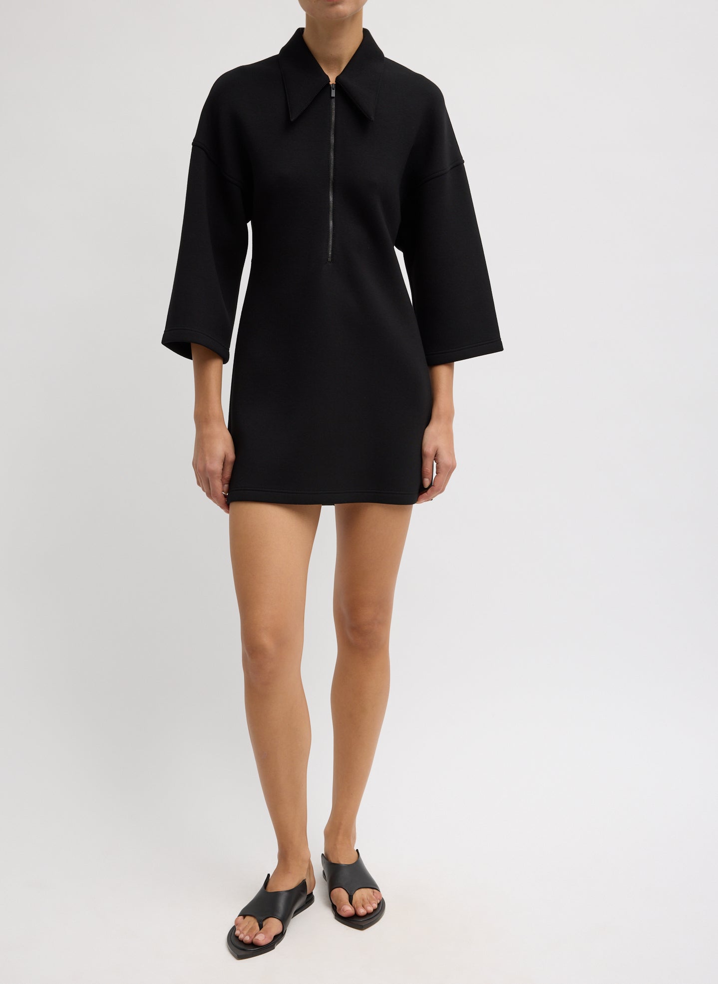 Bonded Viscose Zip Front Short Sleeve Slim Tunic - Black Bonded Viscose Zip Front Short Sleeve Slim Tunic - front view on model