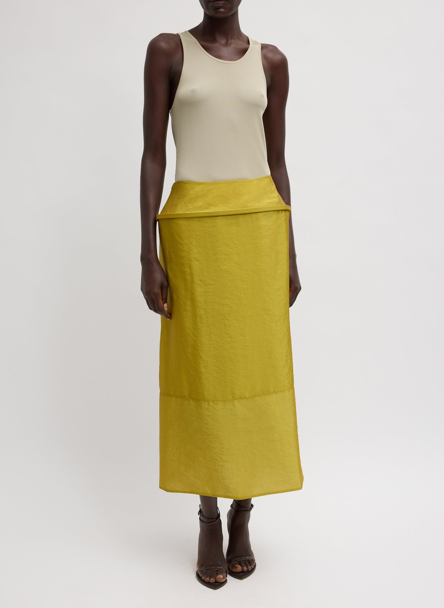Chassis Hoop Pencil Skirt - Dijon Chassis Hoop Pencil Skirt - mustard yellow midi skirt with hoop insert at waist, front view on model