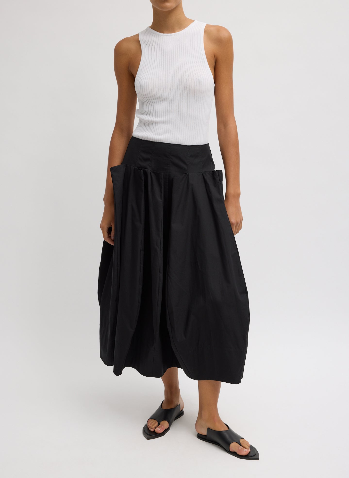 Compact Eco Poplin Pinched Pleat Full Skirt - Black Compact Eco Poplin Pinched Pleat Full Skirt - front view on model
