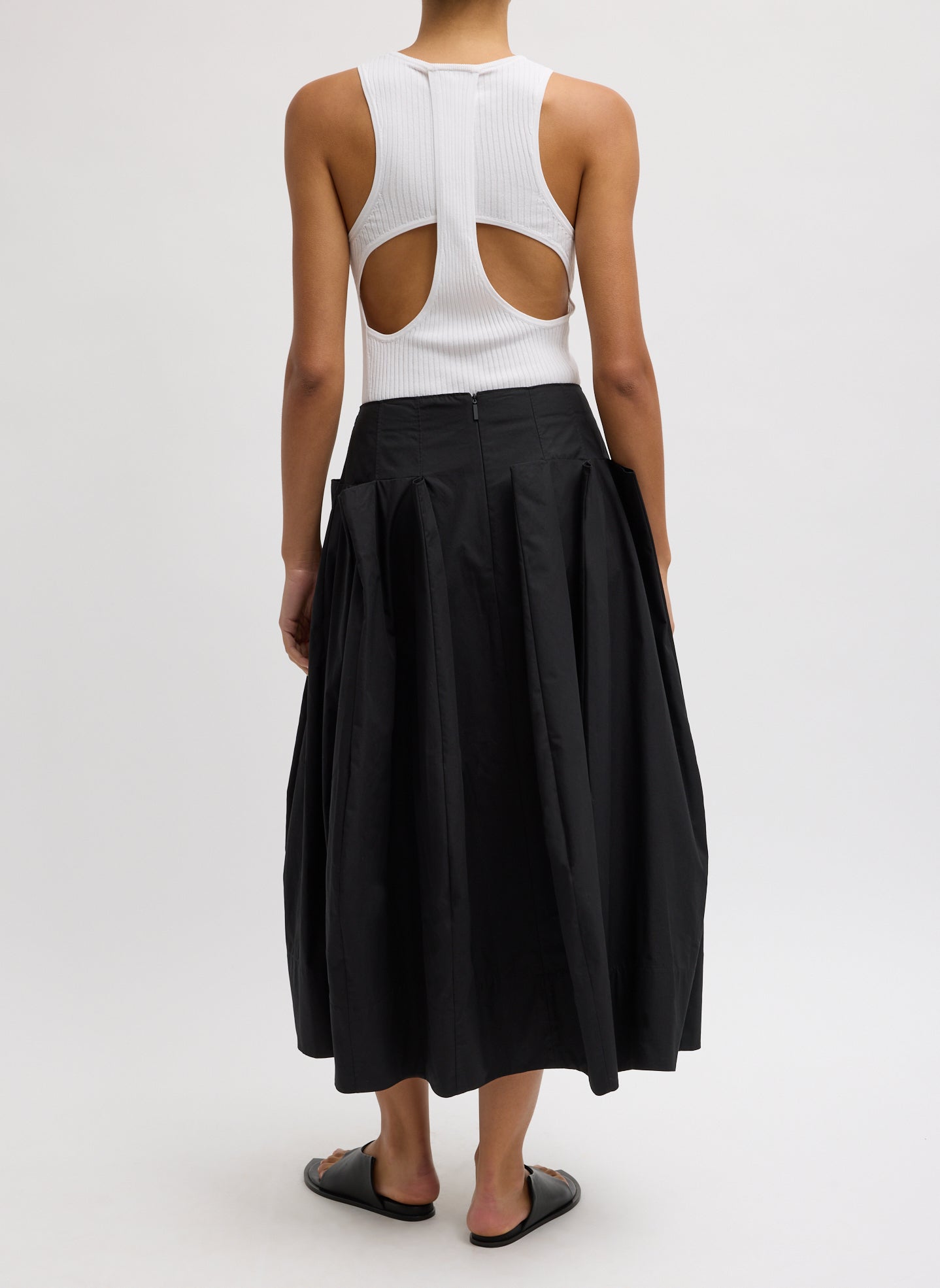 Black Compact Eco Poplin Pinched Pleat Full Skirt - back view on model