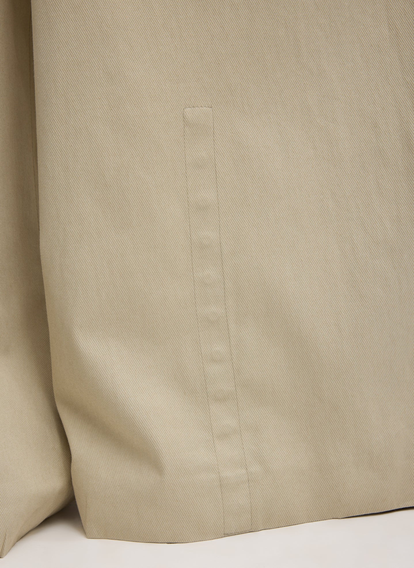 Taupe Luxe Spring Twill Tucked Pleated Wide Leg Trouser - closeup of hidden snap details at hem