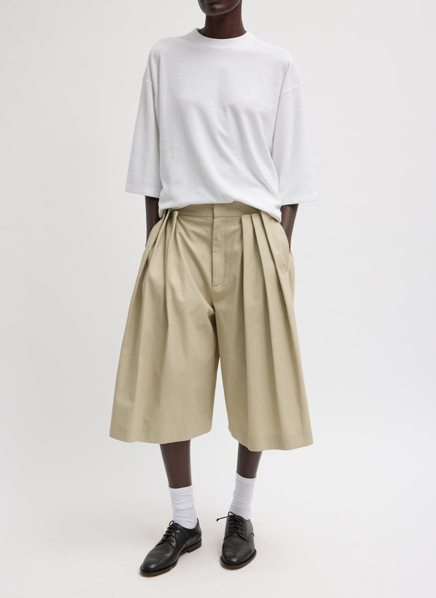 Luxe Spring Twill Tucked Pleated Wide Leg Short - Taupe Spring Twill Tucked Pleated Wide Leg Short - front view on model
