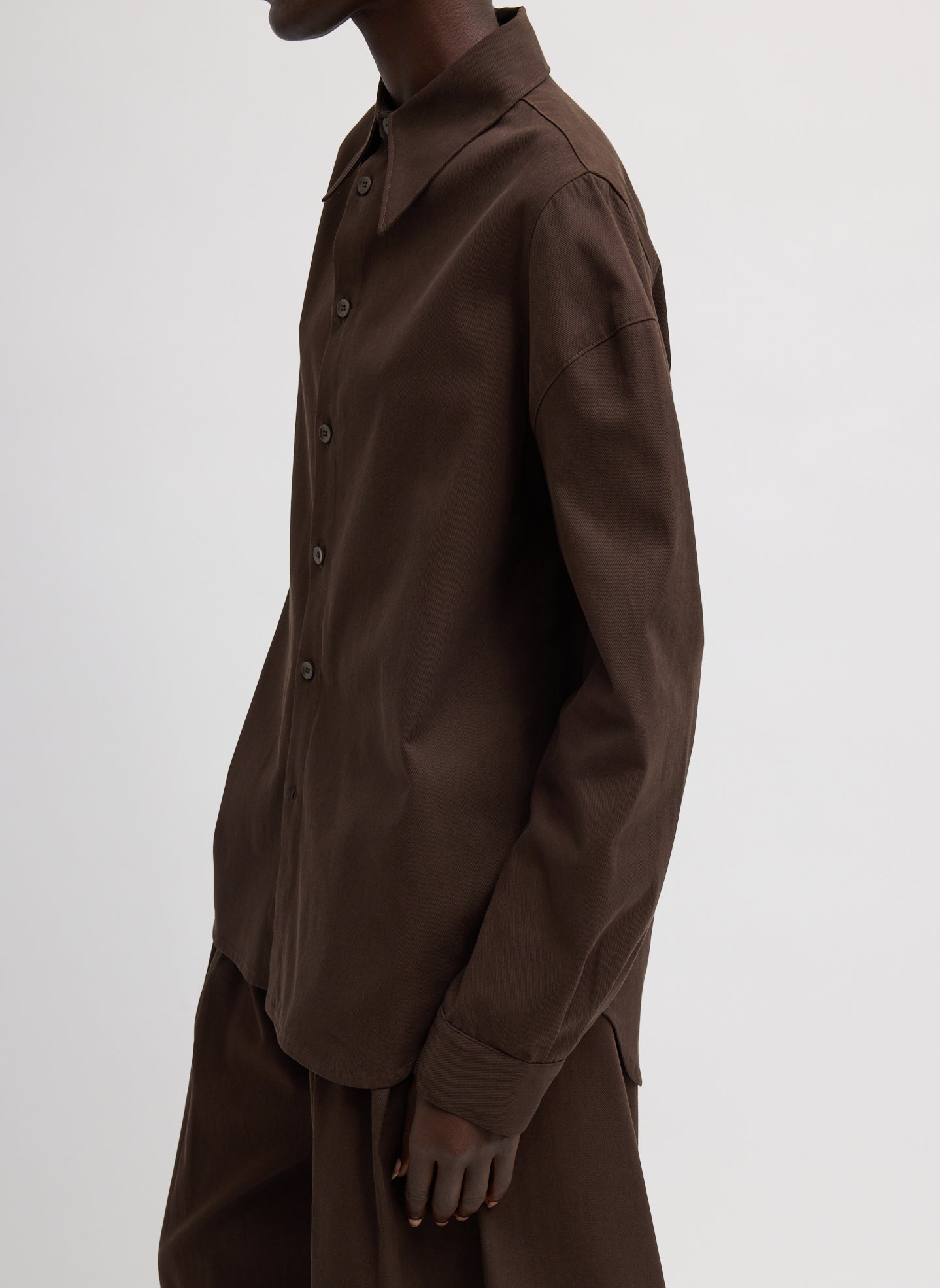 Hickory Brown Luxe Spring Twill Hinged Shirt - long sleeve button down, side view on model