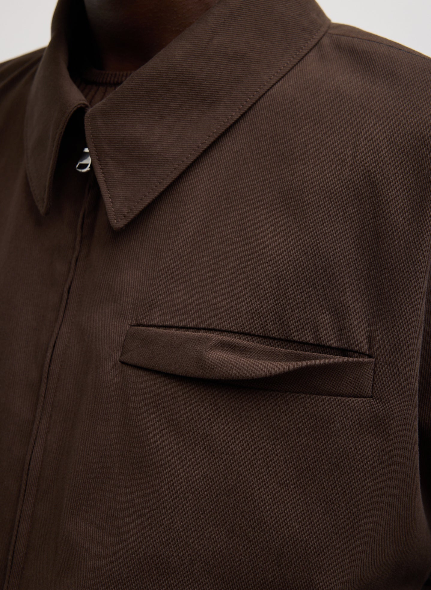 Hickory Brown Luxe Spring Twill Bomber Jacket - closeup of front pocket detail