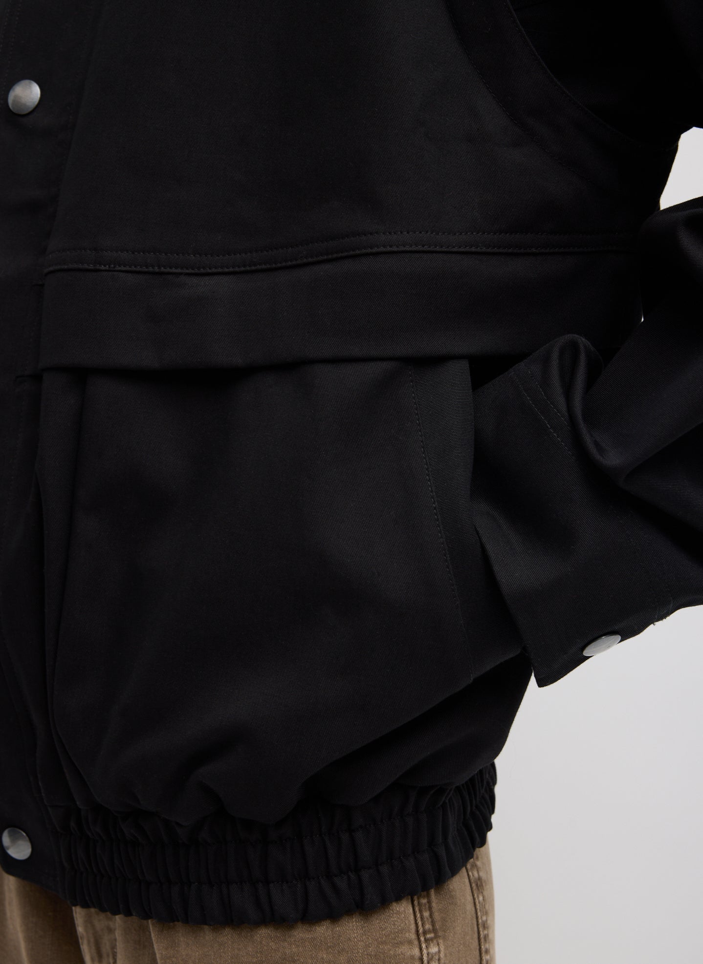 Black Patchwork Twill Bomber Jacket - closeup of side pocket detail