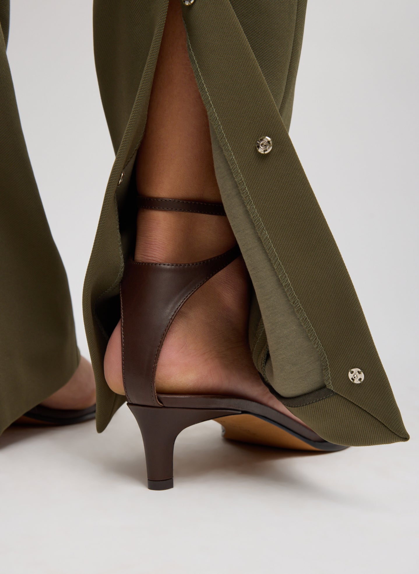 Nori Green Spring Bonded Twill Elfie Trouser With Slits - closeup of back slits