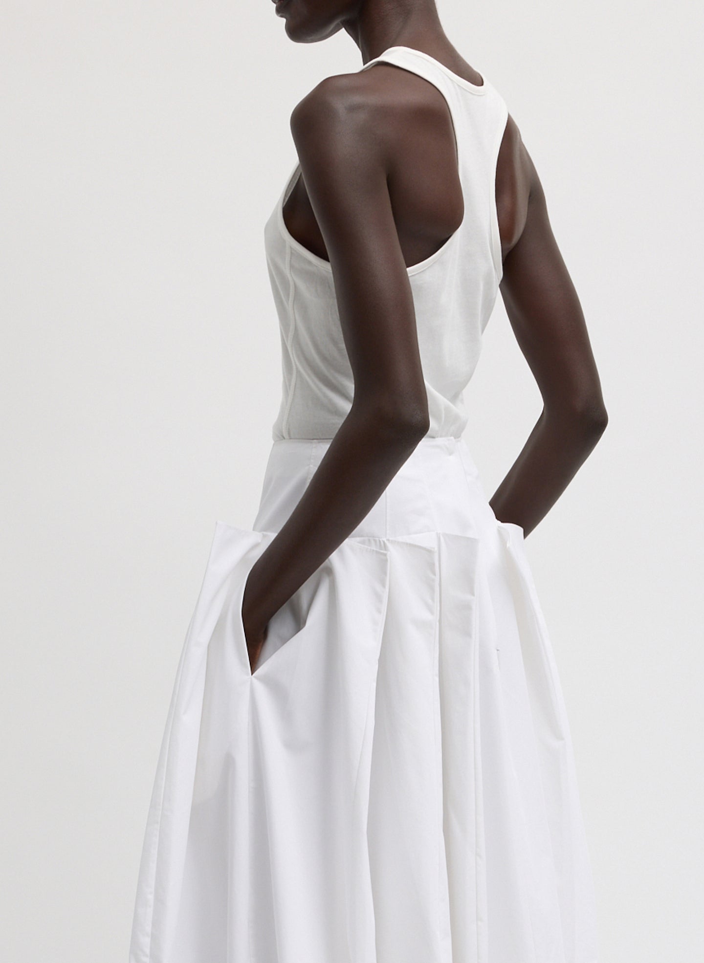 White Racerback Bodysuit - sleeveless tank, side view on model