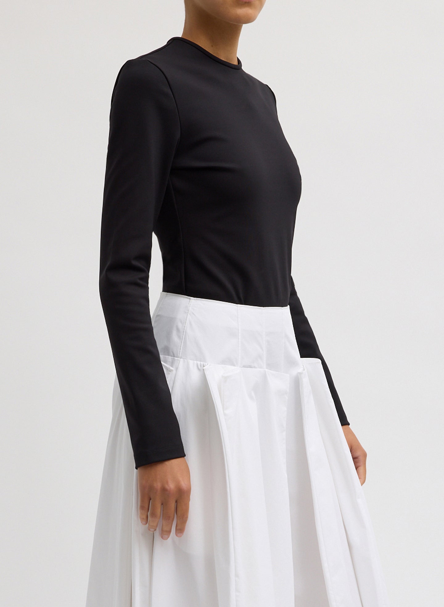 Black Compact Ultra Stretch Cut Out Back Top - long sleeve, side view on model