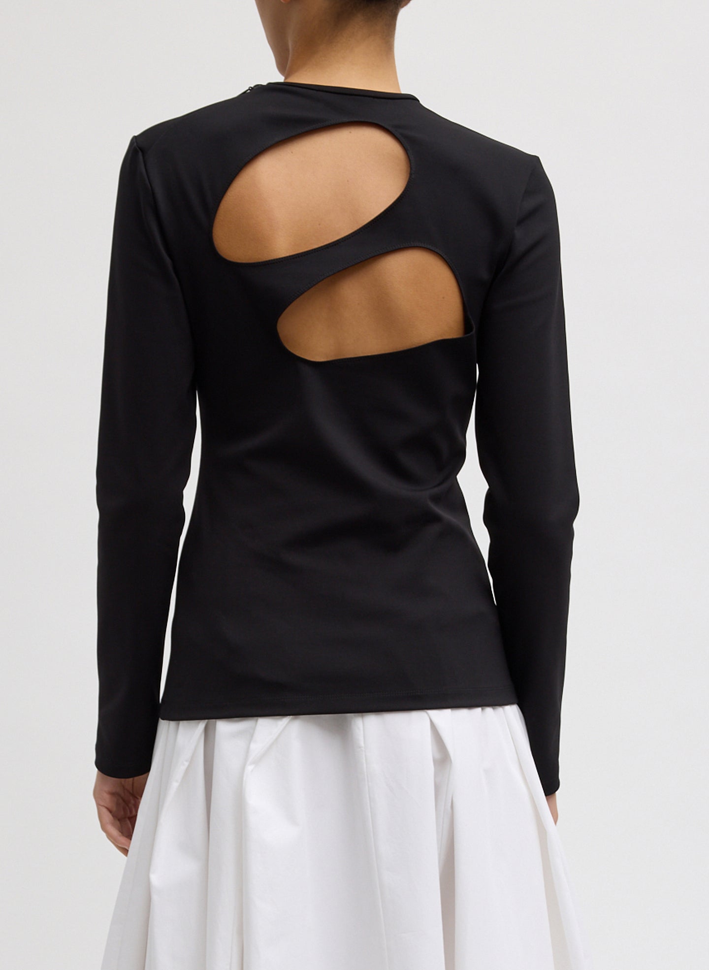 Black Compact Ultra Stretch Cut Out Back Top - long sleeve, back view on model