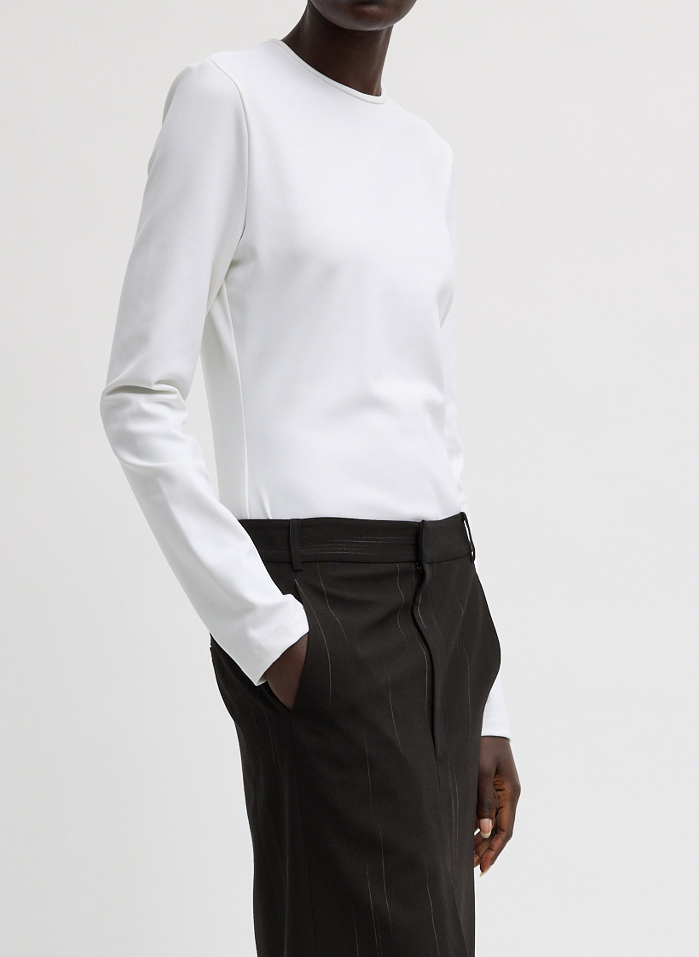 White Compact Ultra Stretch Cut Out Back Top - long sleeve, side view on model