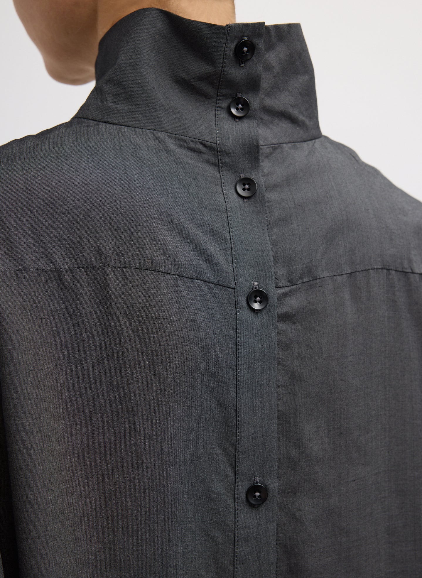 Black Ultra Light Silk Tencel Funnel Neck Shirt - closeup of buttons at back