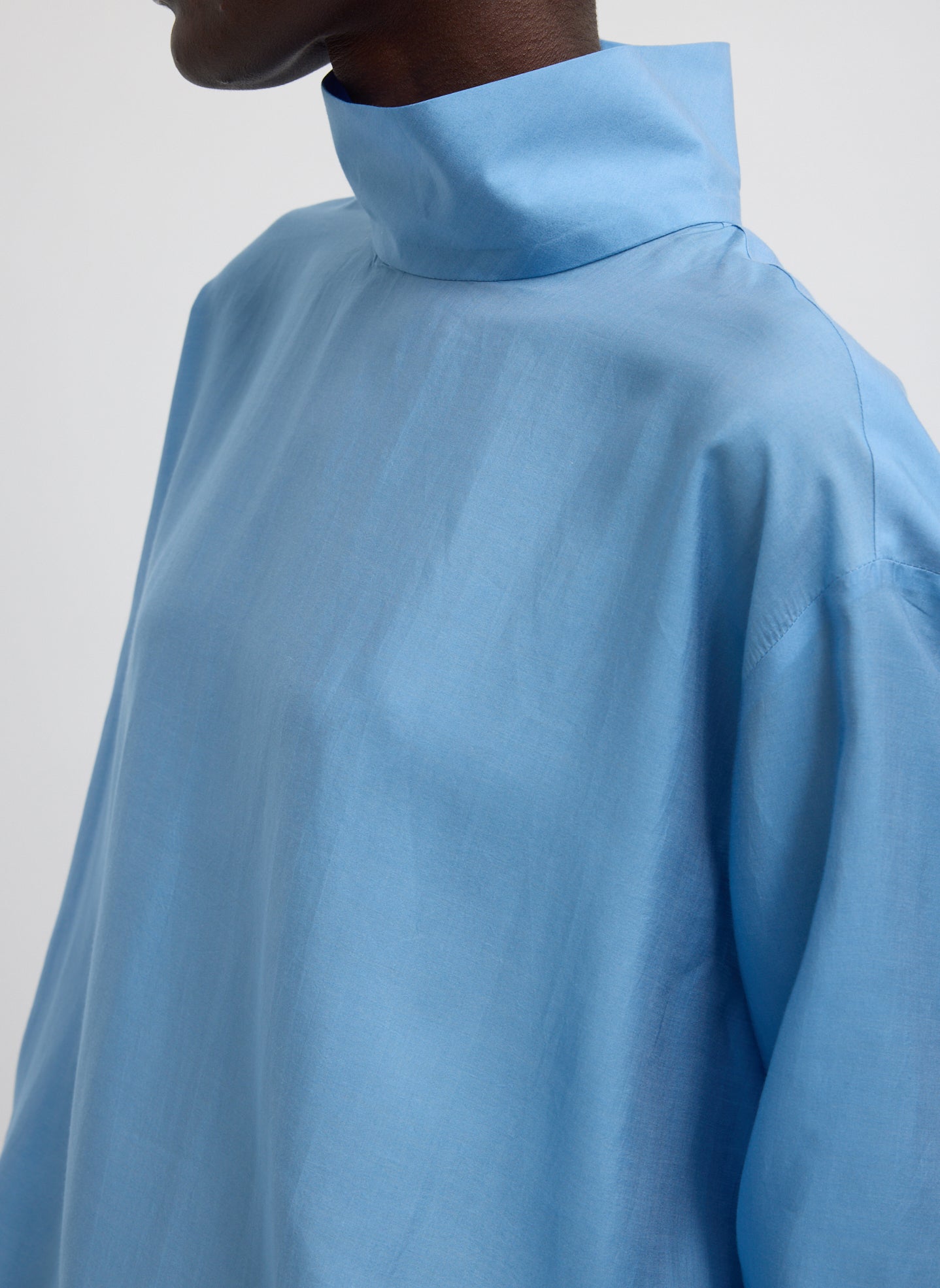 Blue Ultra Light Silk Tencel Funnel Neck Shirt - closeup of funnel neck