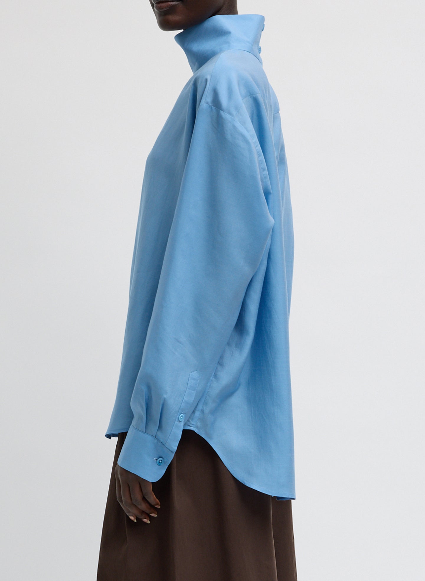 Blue Ultra Light Silk Tencel Funnel Neck Shirt - side view on model