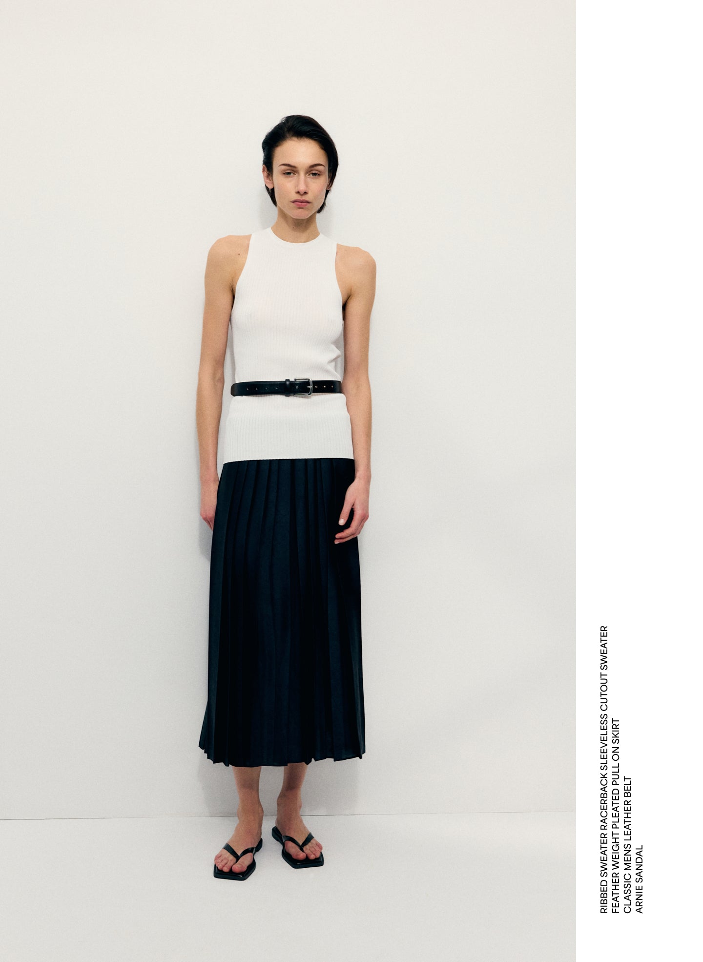 Black Feather Weight Pleated Pull On Skirt - editorial image on model
