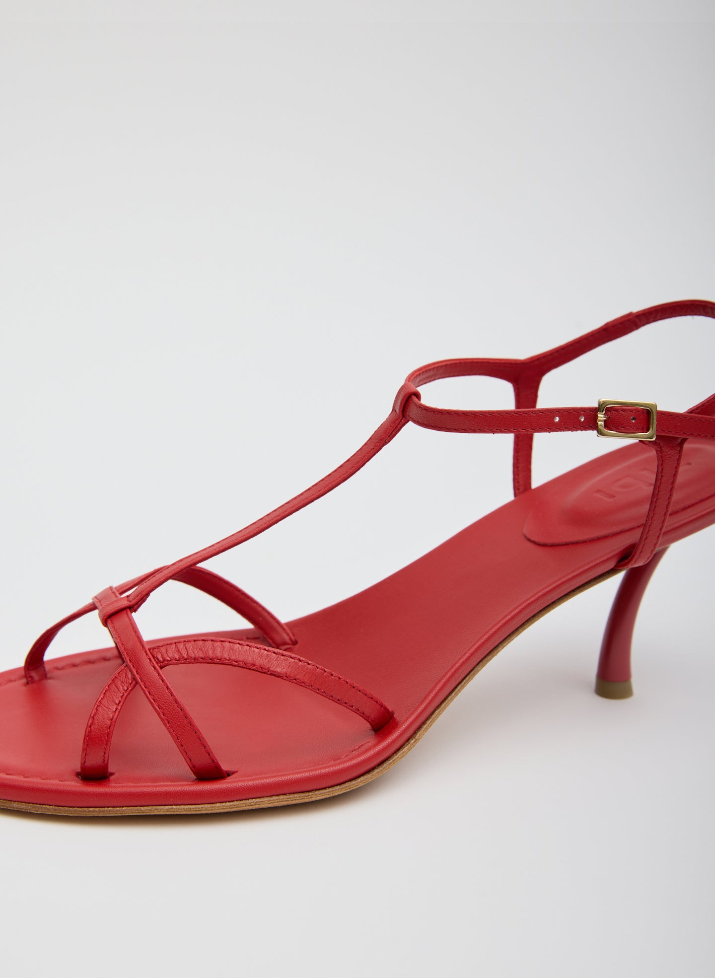 Red Milbourne Heel - closeup of leather strap details