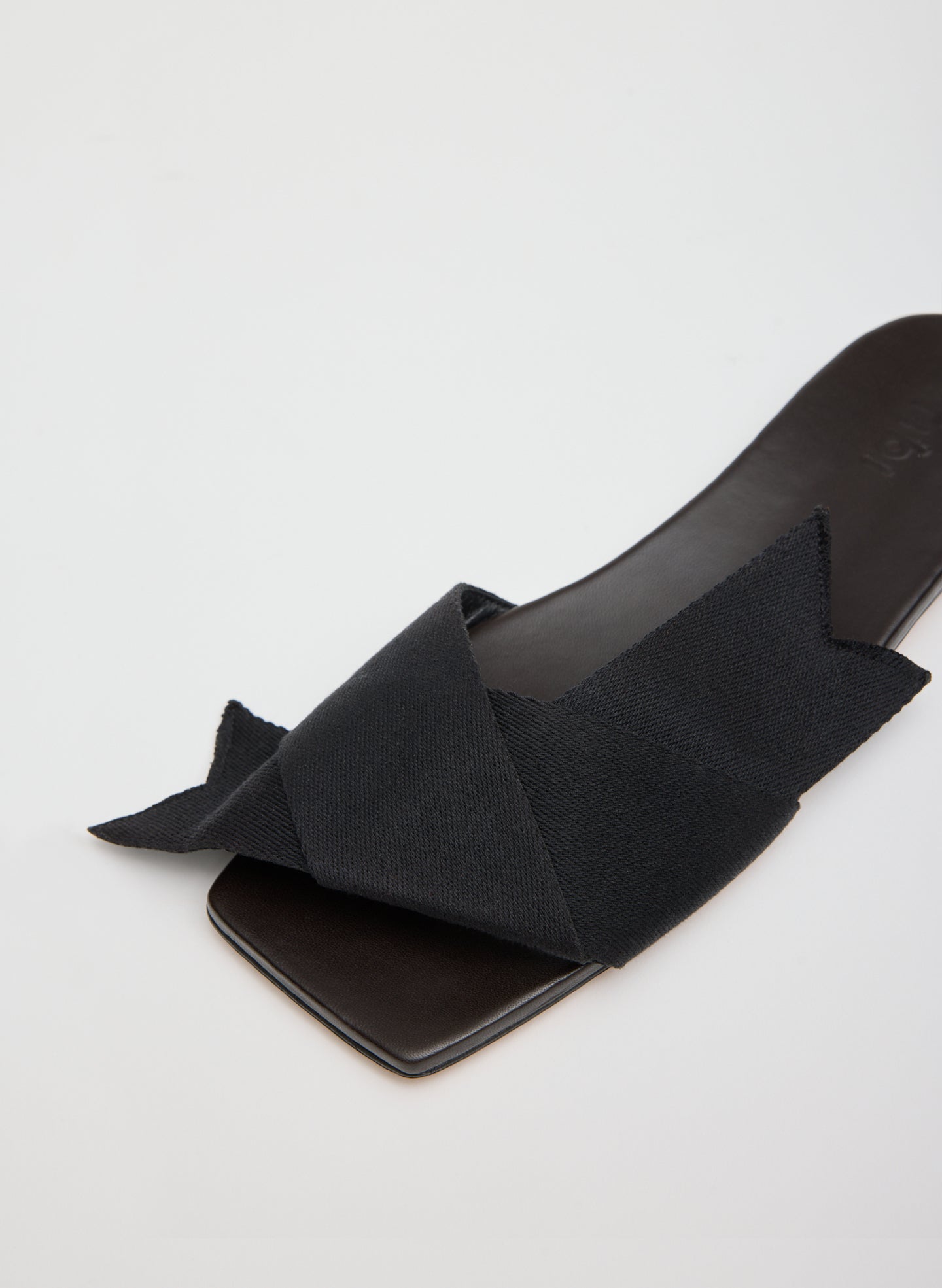 Dark Brown Adrien Sandal - closeup of bow detail