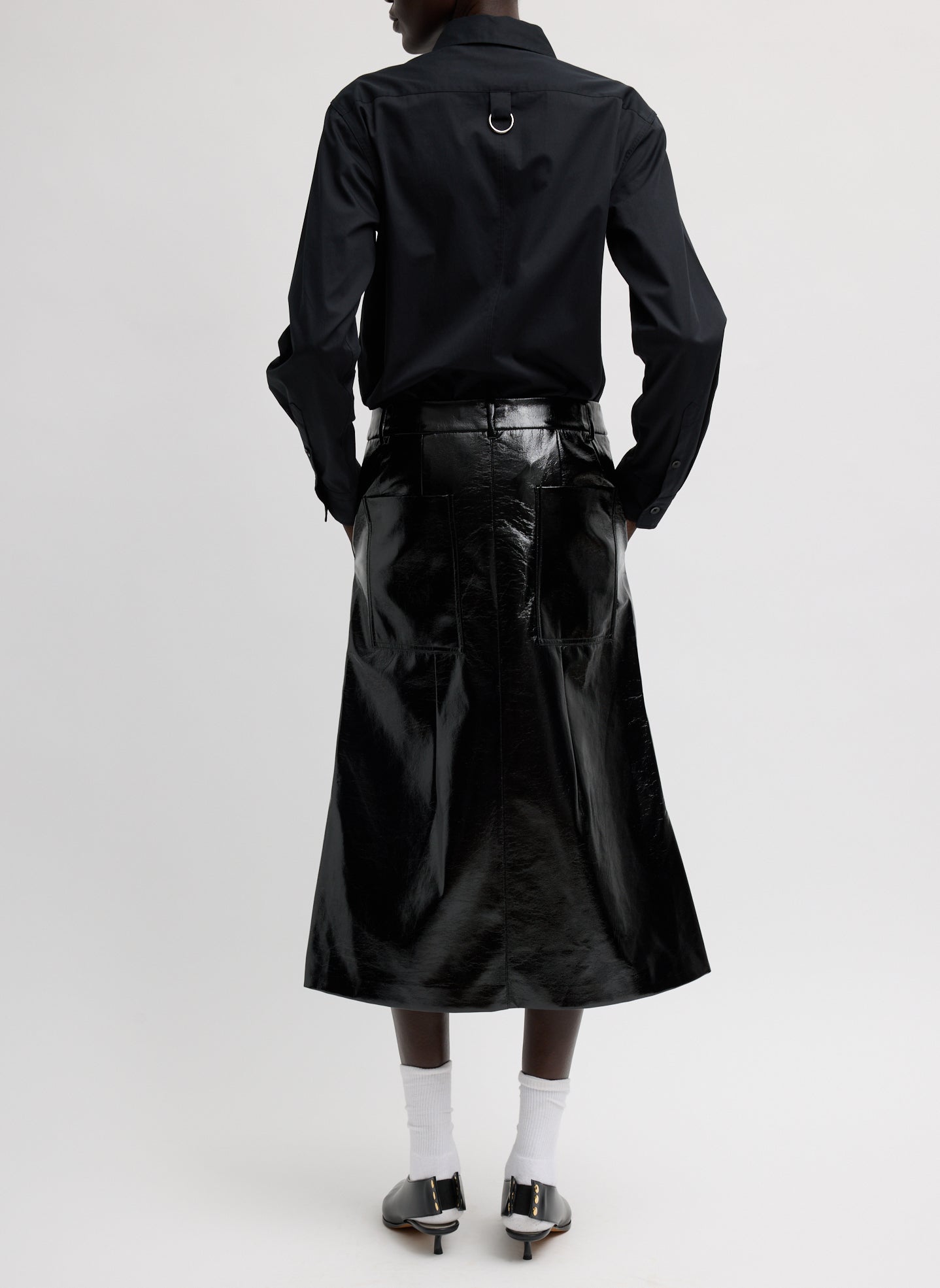 Black Faux Patent Leather Sculpted Silke Skirt - full look, back view on model