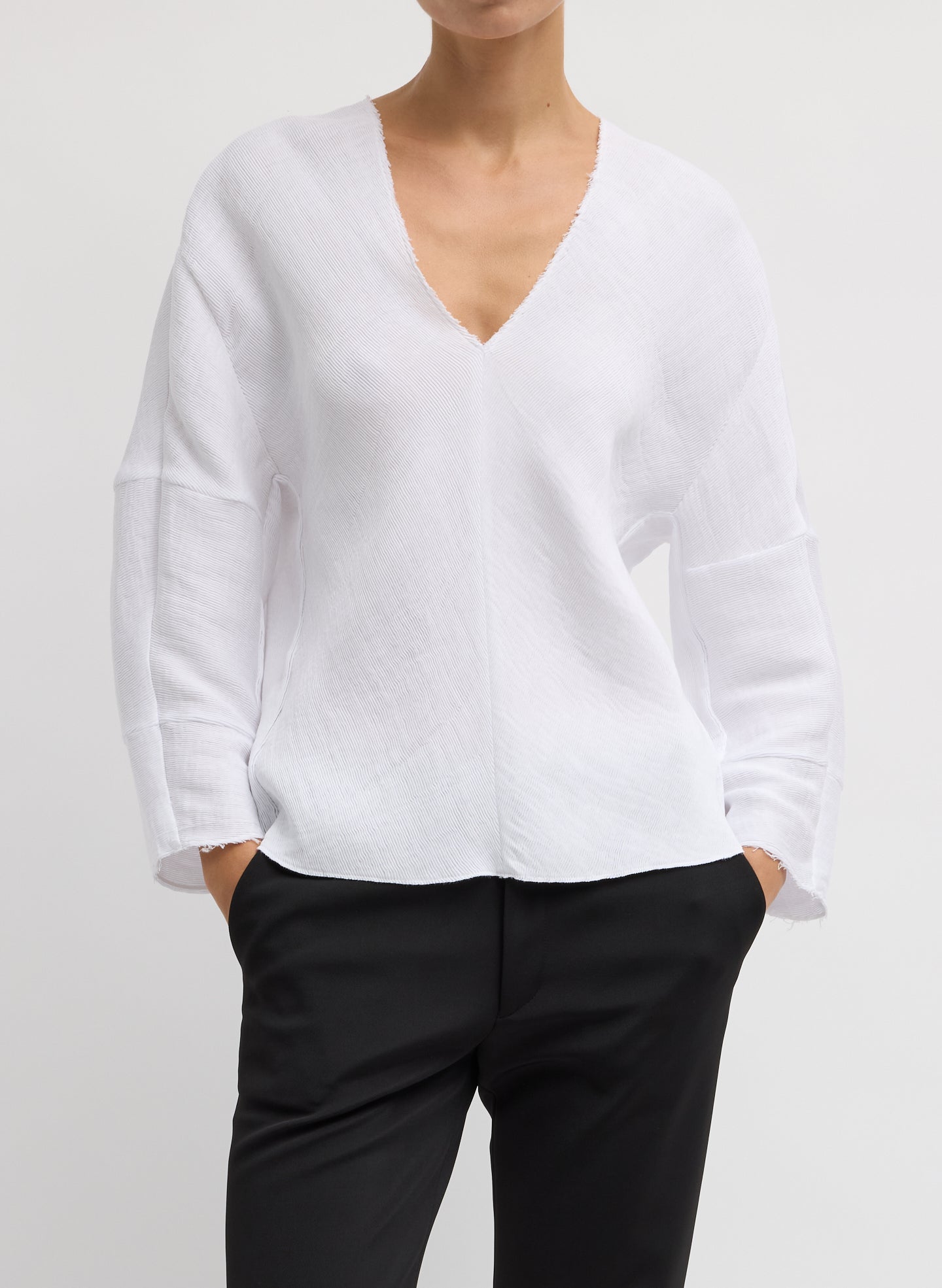 Viscose Plisse Hinged Long Sleeve Top - White Viscose Plisse Hinged Long Sleeve Top - front view on model