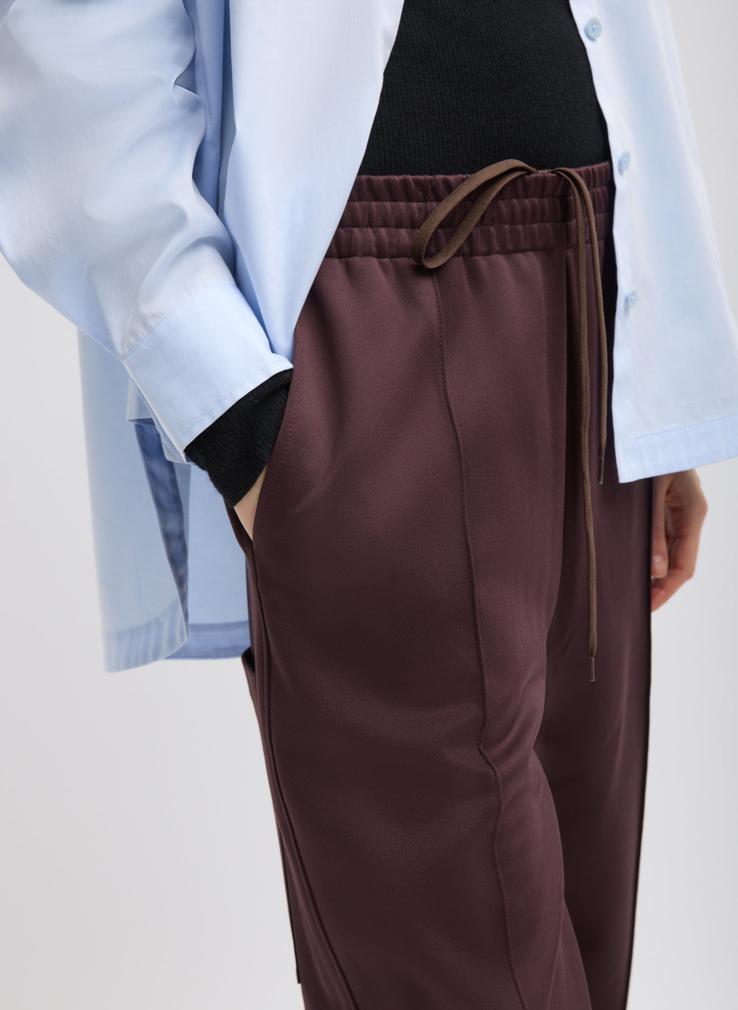 Brown Active Knit Scottie Jogger - closeup of active knit fabric and drawstring detail