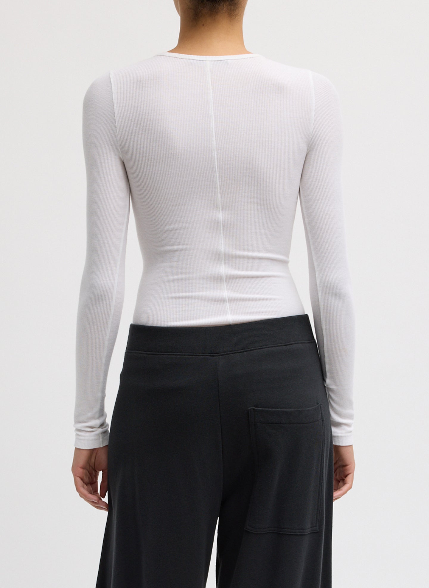 White Circular Ribbed Crewneck Pullover T-Shirt - back view on model