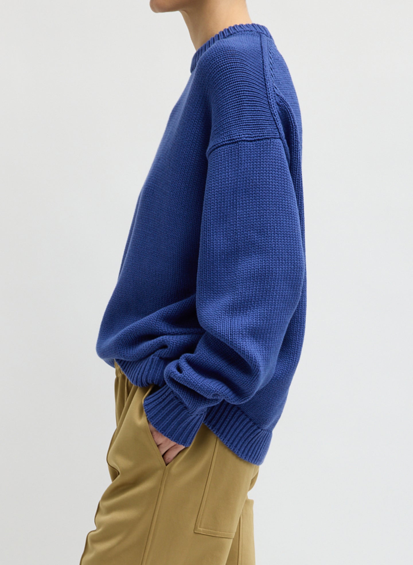 Blue Cotton Wool Crewneck Pullover - thick knit sweater, side view on model