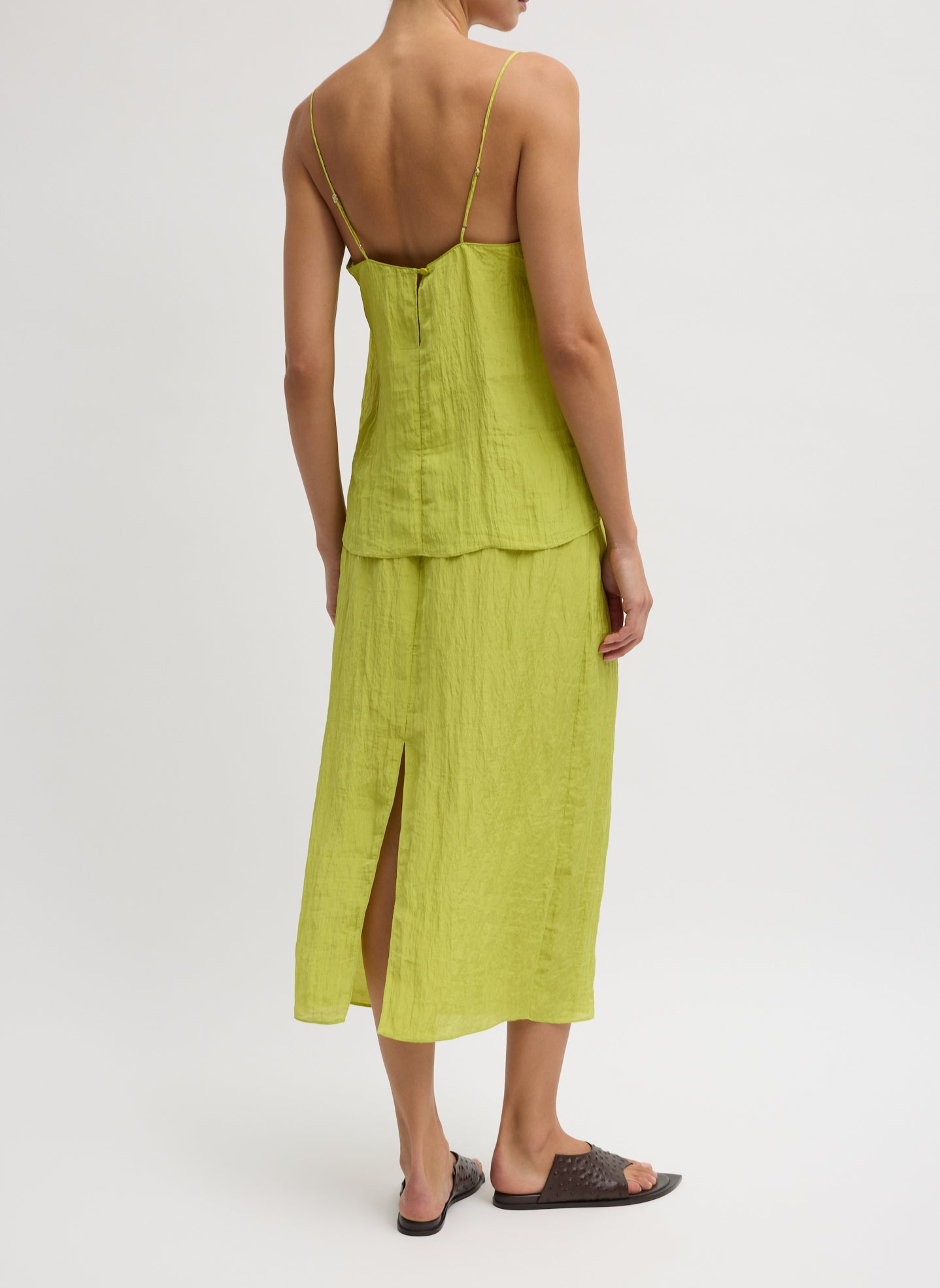 Chartreuse Green Crinkle Slip Skirt - silk midi skirt, back view on model