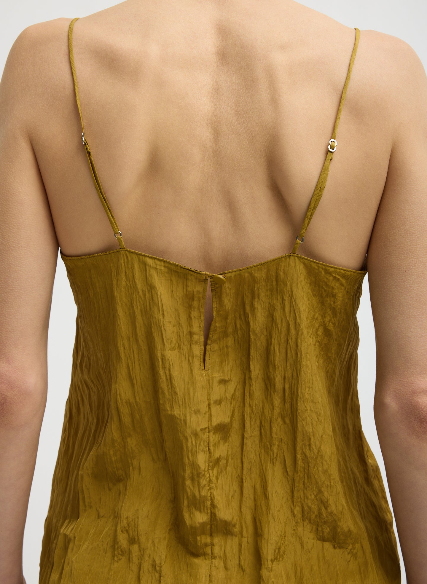Mustard Yellow Crinkle Slip Cami - closeup of adjustable straps and button closure at back