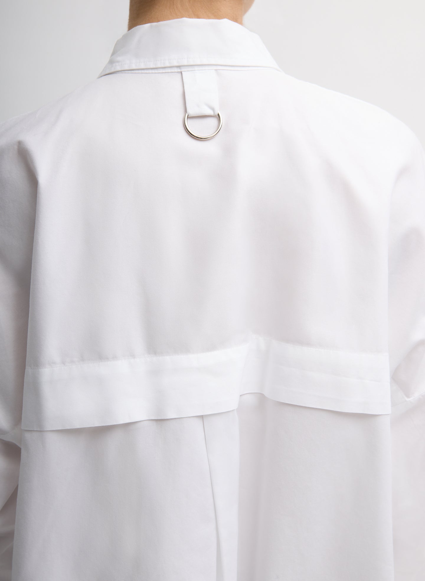 White Gabe Oversized Shirt - closeup of back ring detail